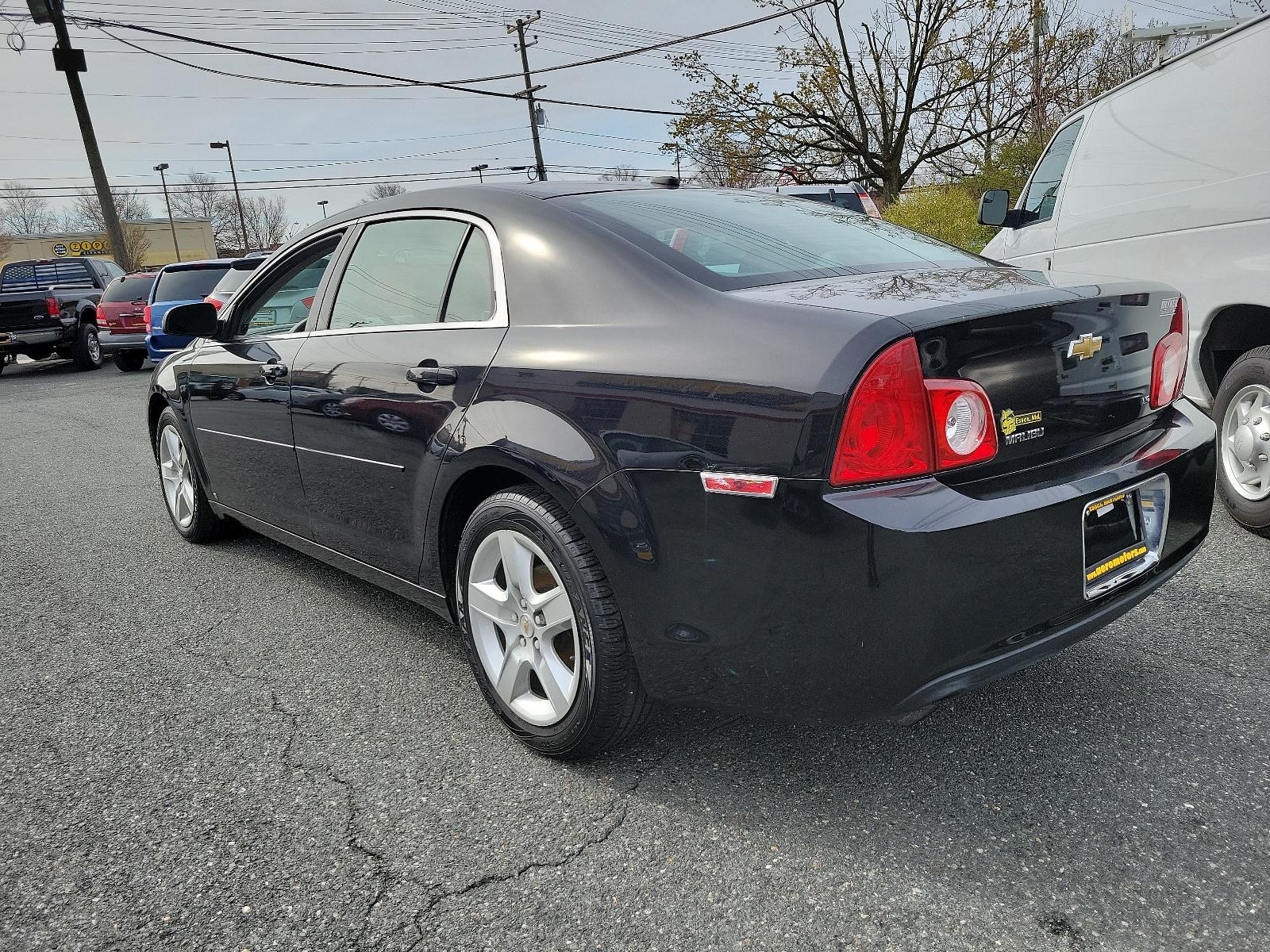 2009 Black Granite Metallic - 58U /Titanium - 83B Chevrolet Malibu LS w/1LS (1G1ZG57BX94) with an ENGINE, ECOTEC 2.4L DOHC, 16-VALVE, 4-CYLINDER VARIABLE VALVE TIMING MFI engine, located at 50 Eastern Blvd., Essex, MD, 21221, (410) 686-3444, 39.304367, -76.484947 - Experience the prowess of expert engineering with the 2009 Chevrolet Malibu LS w/1LS 4dr sdn ls w/1ls. It's not just a car but a statement on wheels. Coated in glossy black granite metallic - 58U exterior complemented by a classy titanium - 83B interior, this car embodies sophistication. The aesthet - Photo #5