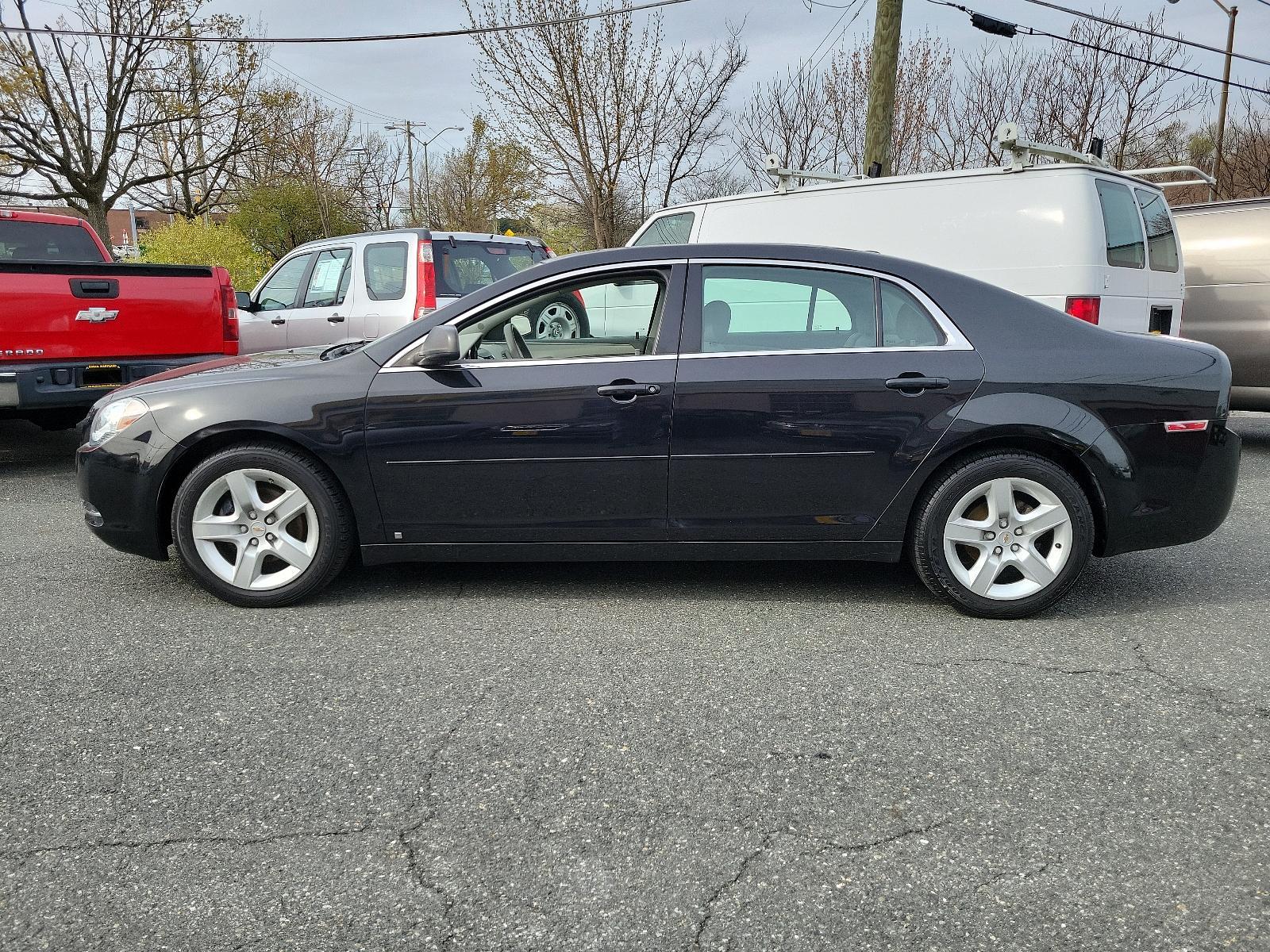2009 Black Granite Metallic - 58U /Titanium - 83B Chevrolet Malibu LS w/1LS (1G1ZG57BX94) with an ENGINE, ECOTEC 2.4L DOHC, 16-VALVE, 4-CYLINDER VARIABLE VALVE TIMING MFI engine, located at 50 Eastern Blvd., Essex, MD, 21221, (410) 686-3444, 39.304367, -76.484947 - Experience the prowess of expert engineering with the 2009 Chevrolet Malibu LS w/1LS 4dr sdn ls w/1ls. It's not just a car but a statement on wheels. Coated in glossy black granite metallic - 58U exterior complemented by a classy titanium - 83B interior, this car embodies sophistication. The aesthet - Photo #6