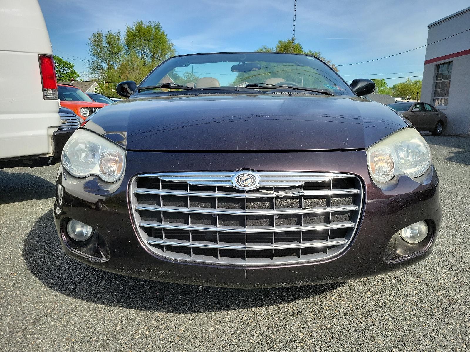 2004 Deep Lava Red Metallic - PMQ /Sandstone - T5 Chrysler Sebring LXi (1C3EL55R24N) with an 2.7L (164) MPI DOHC 24-VALVE V6 ENGINE engine, located at 50 Eastern Blvd., Essex, MD, 21221, (410) 686-3444, 39.304367, -76.484947 - Experience the perfect blend of sporty performance and utmost sophistication with our 2004 Chrysler Sebring LXi Convertible. Rendered in a striking Deep Lava Red Metallic exterior, this 2-door beauty offers a stylish stance that's sure to turn heads. Inside, it reveals a pristine Sandstone Interior - Photo #1