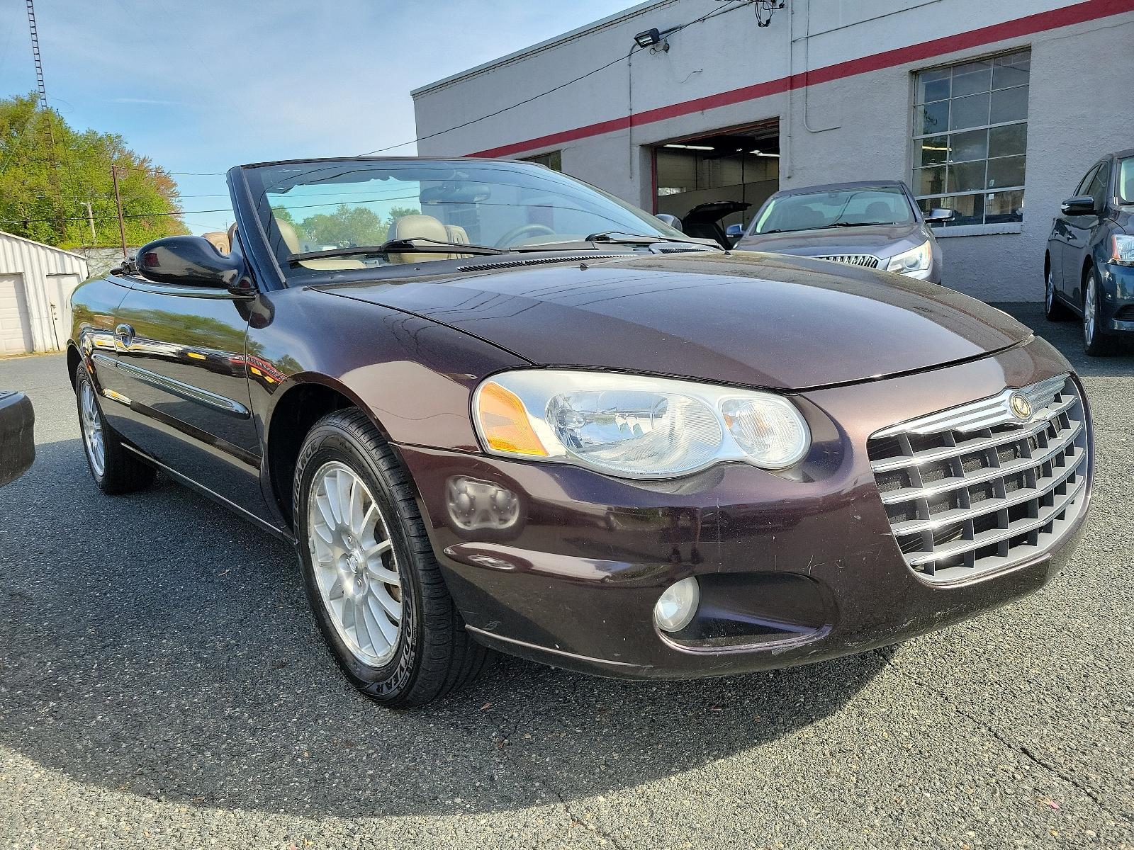 2004 Deep Lava Red Metallic - PMQ /Sandstone - T5 Chrysler Sebring LXi (1C3EL55R24N) with an 2.7L (164) MPI DOHC 24-VALVE V6 ENGINE engine, located at 50 Eastern Blvd., Essex, MD, 21221, (410) 686-3444, 39.304367, -76.484947 - Experience the perfect blend of sporty performance and utmost sophistication with our 2004 Chrysler Sebring LXi Convertible. Rendered in a striking Deep Lava Red Metallic exterior, this 2-door beauty offers a stylish stance that's sure to turn heads. Inside, it reveals a pristine Sandstone Interior - Photo #2