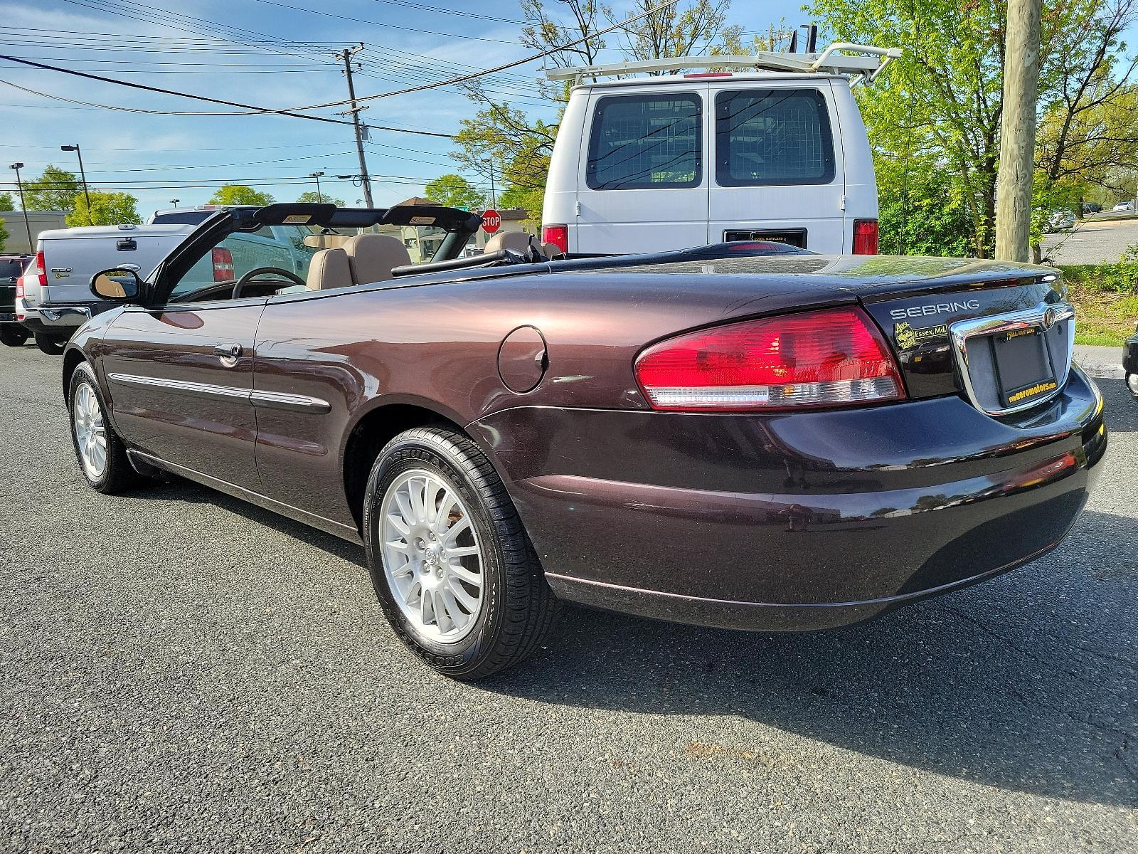2004 Deep Lava Red Metallic - PMQ /Sandstone - T5 Chrysler Sebring LXi (1C3EL55R24N) with an 2.7L (164) MPI DOHC 24-VALVE V6 ENGINE engine, located at 50 Eastern Blvd., Essex, MD, 21221, (410) 686-3444, 39.304367, -76.484947 - Experience the perfect blend of sporty performance and utmost sophistication with our 2004 Chrysler Sebring LXi Convertible. Rendered in a striking Deep Lava Red Metallic exterior, this 2-door beauty offers a stylish stance that's sure to turn heads. Inside, it reveals a pristine Sandstone Interior - Photo #5