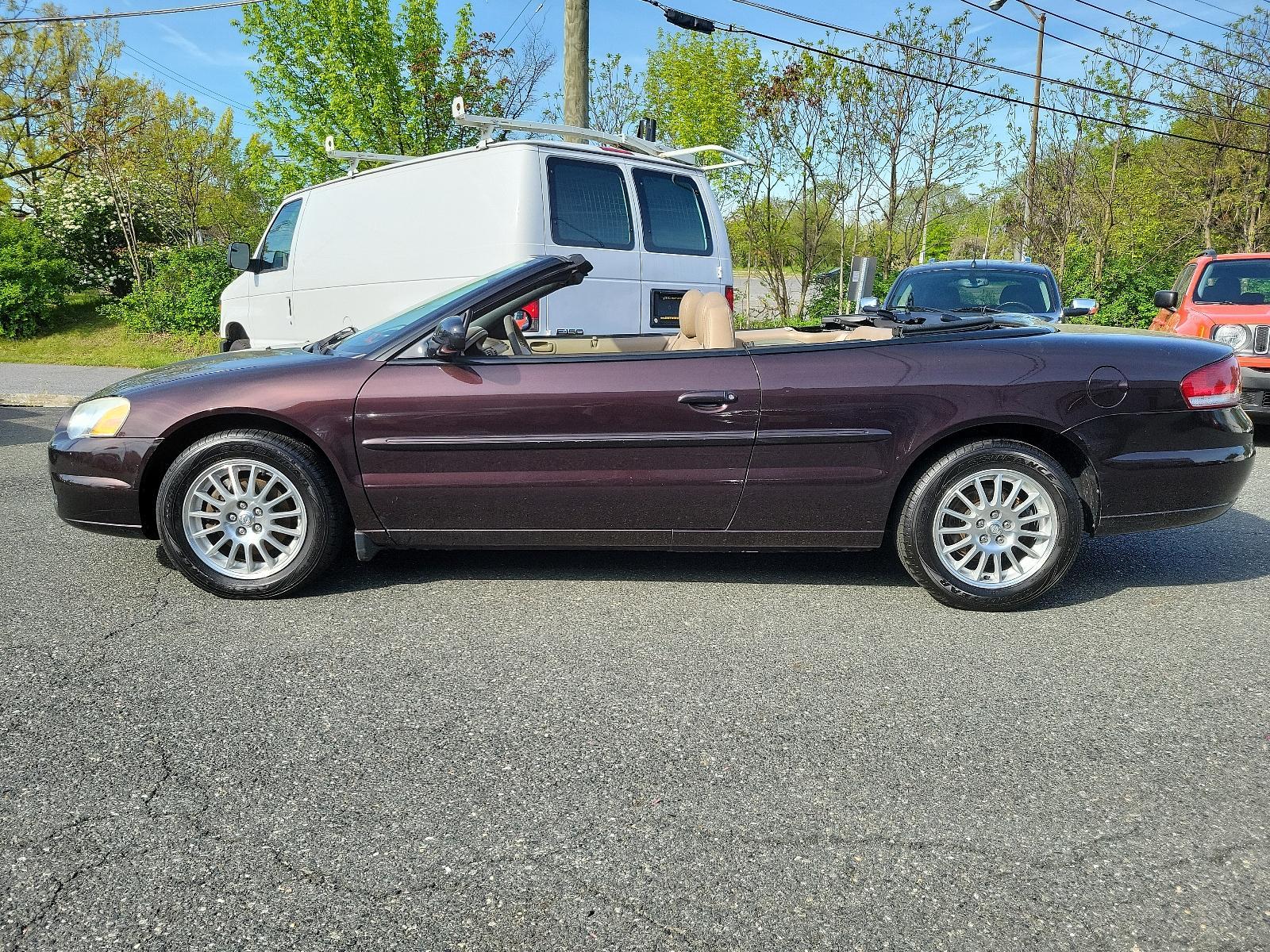 2004 Deep Lava Red Metallic - PMQ /Sandstone - T5 Chrysler Sebring LXi (1C3EL55R24N) with an 2.7L (164) MPI DOHC 24-VALVE V6 ENGINE engine, located at 50 Eastern Blvd., Essex, MD, 21221, (410) 686-3444, 39.304367, -76.484947 - Experience the perfect blend of sporty performance and utmost sophistication with our 2004 Chrysler Sebring LXi Convertible. Rendered in a striking Deep Lava Red Metallic exterior, this 2-door beauty offers a stylish stance that's sure to turn heads. Inside, it reveals a pristine Sandstone Interior - Photo #6