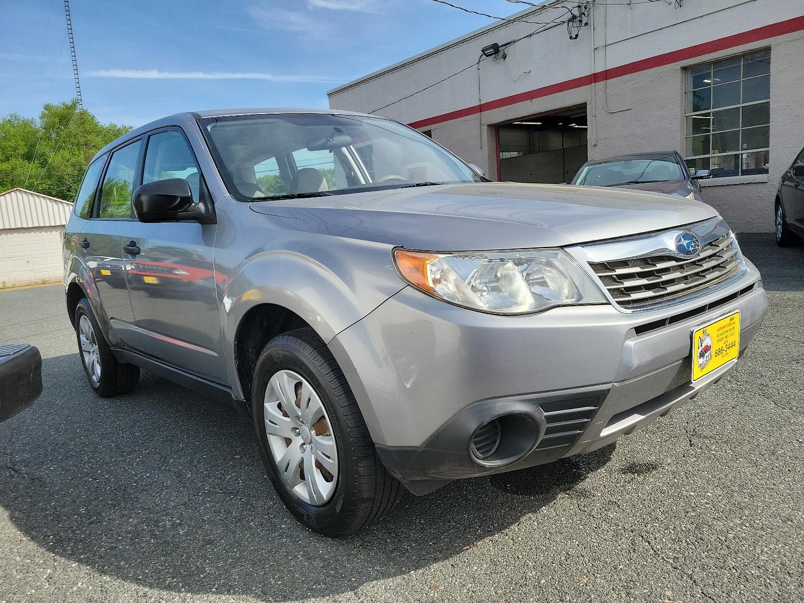 2010 Steel Silver Metallic - SSM /Aurora Platinum - APC Subaru Forester 2.5X (JF2SH6AC5AH) with an 2.5L SOHC SMPI 16-valve 4-cyl boxer engine engine, located at 50 Eastern Blvd., Essex, MD, 21221, (410) 686-3444, 39.304367, -76.484947 - Experience the impeccable blend of comfort, style, and performance in this 2010 Subaru Forester 2.5X. Encased in a striking Steel Silver Metallic exterior paired with an elegant Aurora Platinum interior, this SUV is a statement of sophistication. An ideal choice for the discerning driver, the 2.5l S - Photo #2