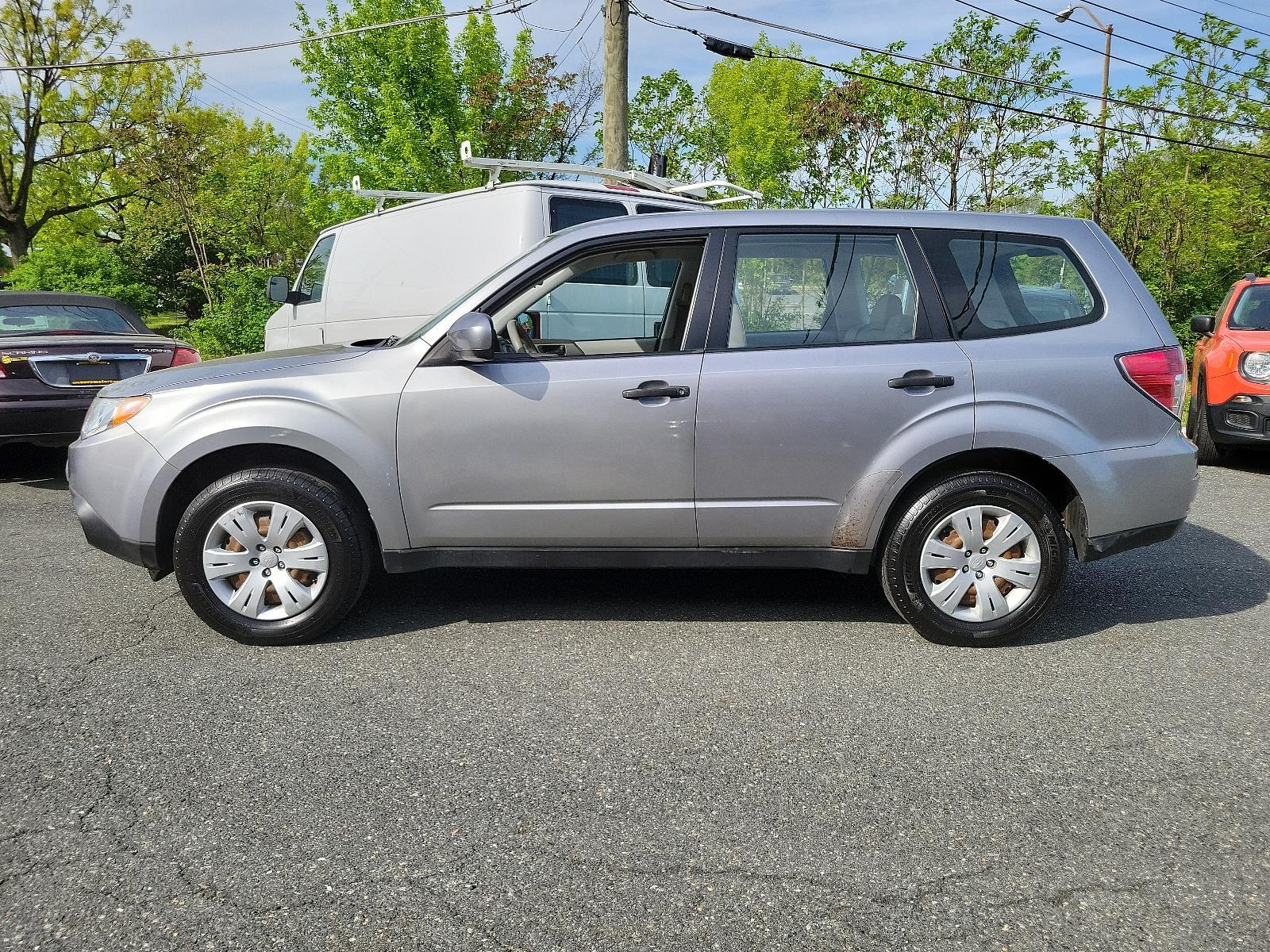 2010 Steel Silver Metallic - SSM /Aurora Platinum - APC Subaru Forester 2.5X (JF2SH6AC5AH) with an 2.5L SOHC SMPI 16-valve 4-cyl boxer engine engine, located at 50 Eastern Blvd., Essex, MD, 21221, (410) 686-3444, 39.304367, -76.484947 - Experience the impeccable blend of comfort, style, and performance in this 2010 Subaru Forester 2.5X. Encased in a striking Steel Silver Metallic exterior paired with an elegant Aurora Platinum interior, this SUV is a statement of sophistication. An ideal choice for the discerning driver, the 2.5l S - Photo #6