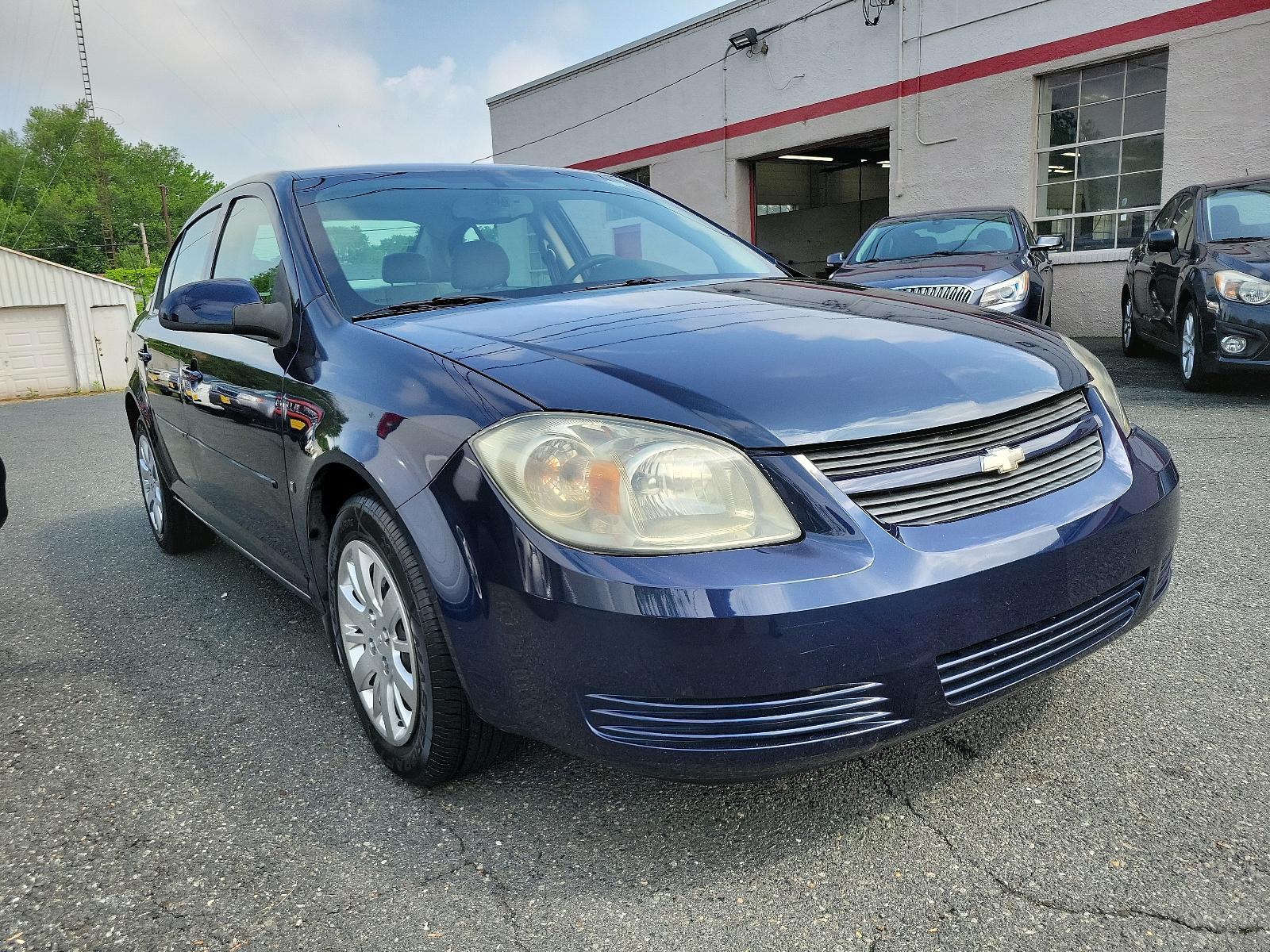 2009 Imperial Blue Metallic - 37U /Gray - 14C Chevrolet Cobalt LT w/1LT (1G1AT58H697) with an ENGINE, ECOTEC 2.2L CONTINUOUS VARIABLE VALVE TIMING DOHC 4-CYLINDER MFI engine, located at 50 Eastern Blvd., Essex, MD, 21221, (410) 686-3444, 39.304367, -76.484947 - Looking to experience exceptional driving comfort and reliability? Meet the 2009 Chevrolet Cobalt LT w/1LT 4dr sedan lt w/1LT, a perfect blend of power and practicality. The sharp look of its Imperial Blue Metallic - 37U exterior paired with the contemporary Gray - 14C interior provides an exquisite - Photo #2