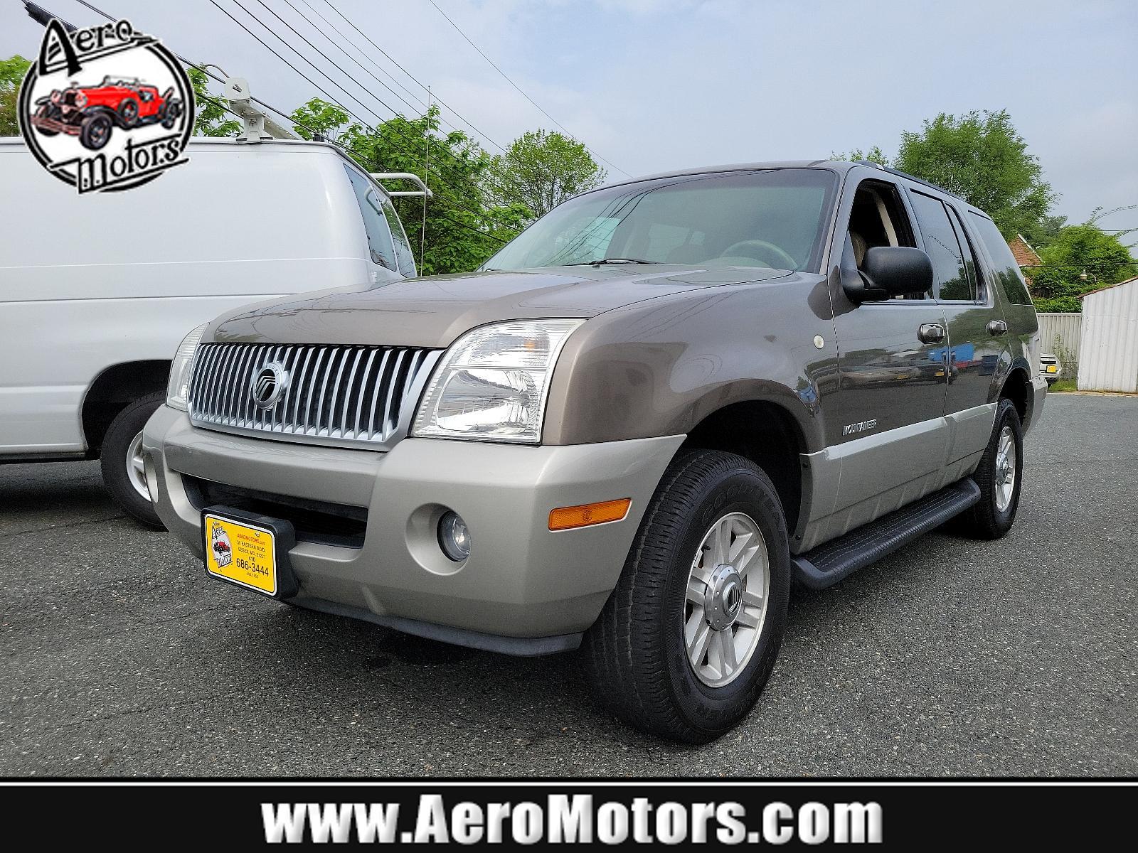 2002 Harvest Gold Metallic - B2 /Dark Parchment - P Mercury Mountaineer (4M2DU86W82U) with an 4.6L (281) SOHC SMPI V8 ENGINE engine, located at 50 Eastern Blvd., Essex, MD, 21221, (410) 686-3444, 39.304367, -76.484947 - Step into the 2002 Mercury Mountaineer, a superb blend of form and function. Boasting an All-Wheel Drive system, it enhances traction and stability for confidence in any driving condition. The exterior stands out with a glistening Harvest Gold Metallic B2 finish, offering a striking, sophisticated a - Photo #0
