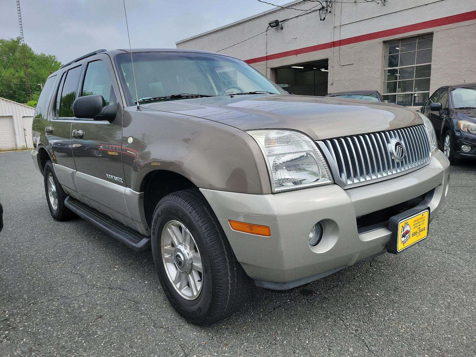2002 Harvest Gold Metallic - B2 /Dark Parchment - P Mercury Mountaineer (4M2DU86W82U) with an 4.6L (281) SOHC SMPI V8 ENGINE engine, located at 50 Eastern Blvd., Essex, MD, 21221, (410) 686-3444, 39.304367, -76.484947 - Step into the 2002 Mercury Mountaineer, a superb blend of form and function. Boasting an All-Wheel Drive system, it enhances traction and stability for confidence in any driving condition. The exterior stands out with a glistening Harvest Gold Metallic B2 finish, offering a striking, sophisticated a - Photo #2