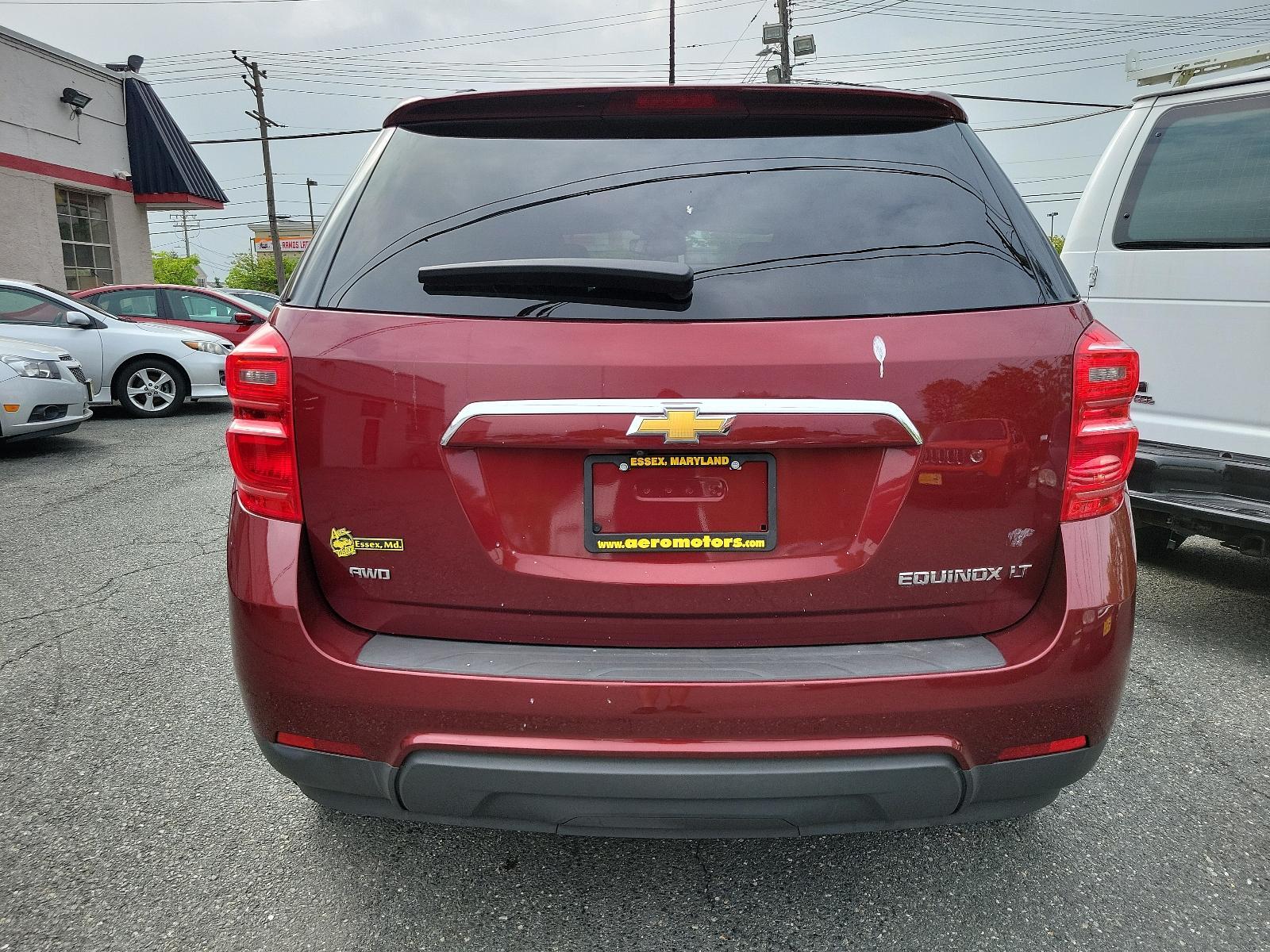 2016 Siren Red Tintcoat - G1E /Jet Black - AFJ Chevrolet Equinox LT (2GNFLFEK0G6) with an ENGINE, 2.4L DOHC 4-CYLINDER SIDI (SPARK IGNITION DIRECT INJECTION) engine, located at 50 Eastern Blvd., Essex, MD, 21221, (410) 686-3444, 39.304367, -76.484947 - Experience the symphony of power and comfort with our 2016 Chevrolet Equinox LT. Coated in a captivating Siren Red Tintcoat G1E exterior, this AWD 4dr LT assessment injects an aura of elegance and sportiness in your daily commute. Enter the cabin, and the luxurious Jet Black - AFJ interior will welc - Photo #4