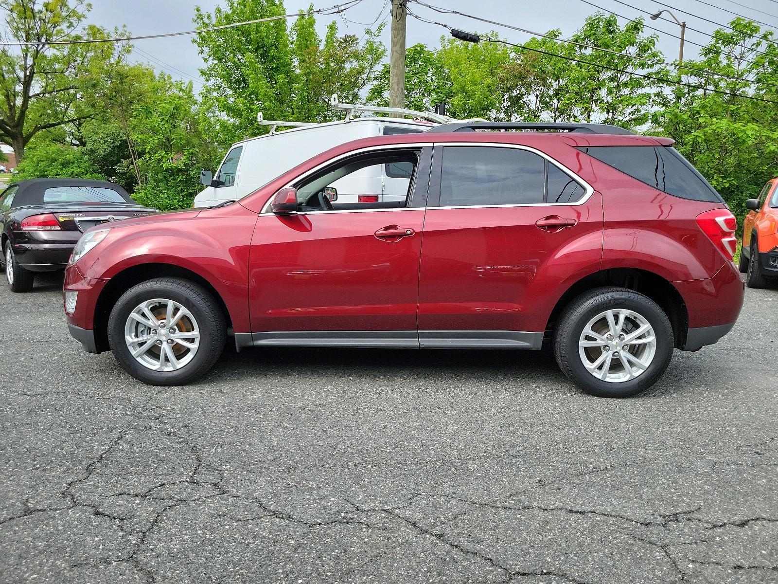 2016 Siren Red Tintcoat - G1E /Jet Black - AFJ Chevrolet Equinox LT (2GNFLFEK0G6) with an ENGINE, 2.4L DOHC 4-CYLINDER SIDI (SPARK IGNITION DIRECT INJECTION) engine, located at 50 Eastern Blvd., Essex, MD, 21221, (410) 686-3444, 39.304367, -76.484947 - Experience the symphony of power and comfort with our 2016 Chevrolet Equinox LT. Coated in a captivating Siren Red Tintcoat G1E exterior, this AWD 4dr LT assessment injects an aura of elegance and sportiness in your daily commute. Enter the cabin, and the luxurious Jet Black - AFJ interior will welc - Photo #6