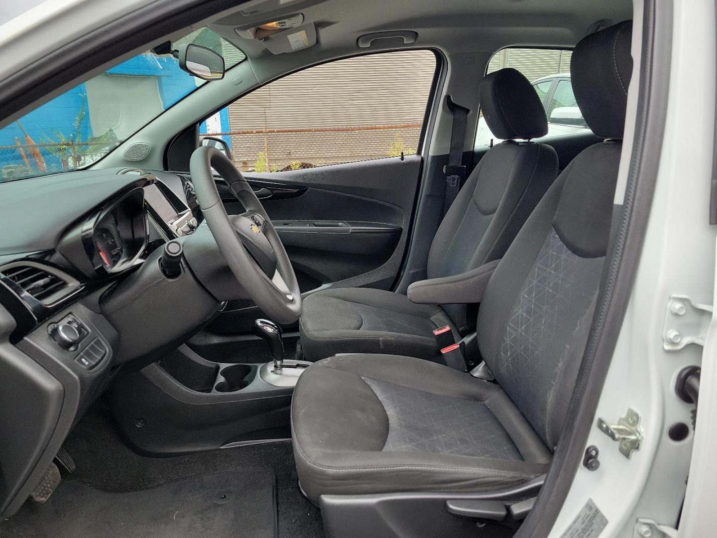 2021 White Chevrolet Spark 1LT CVT (KL8CD6SAXMC) with an 1.4L 4 Cylinder Fuel Injected engine, Automatic transmission, located at 50 Eastern Blvd., Essex, MD, 21221, (410) 686-3444, 39.304367, -76.484947 - Photo#34