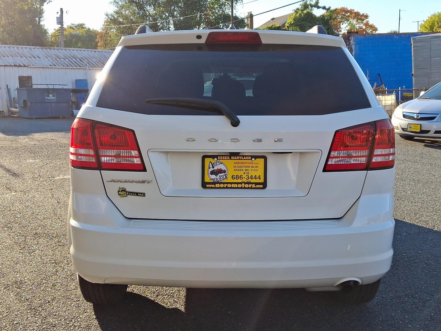 2018 White Dodge Journey SE (3C4PDCAB7JT) with an 2.4L 4 Cylinder Sequential-Port F.I. engine, Automatic transmission, located at 50 Eastern Blvd., Essex, MD, 21221, (410) 686-3444, 39.304367, -76.484947- Photo#4