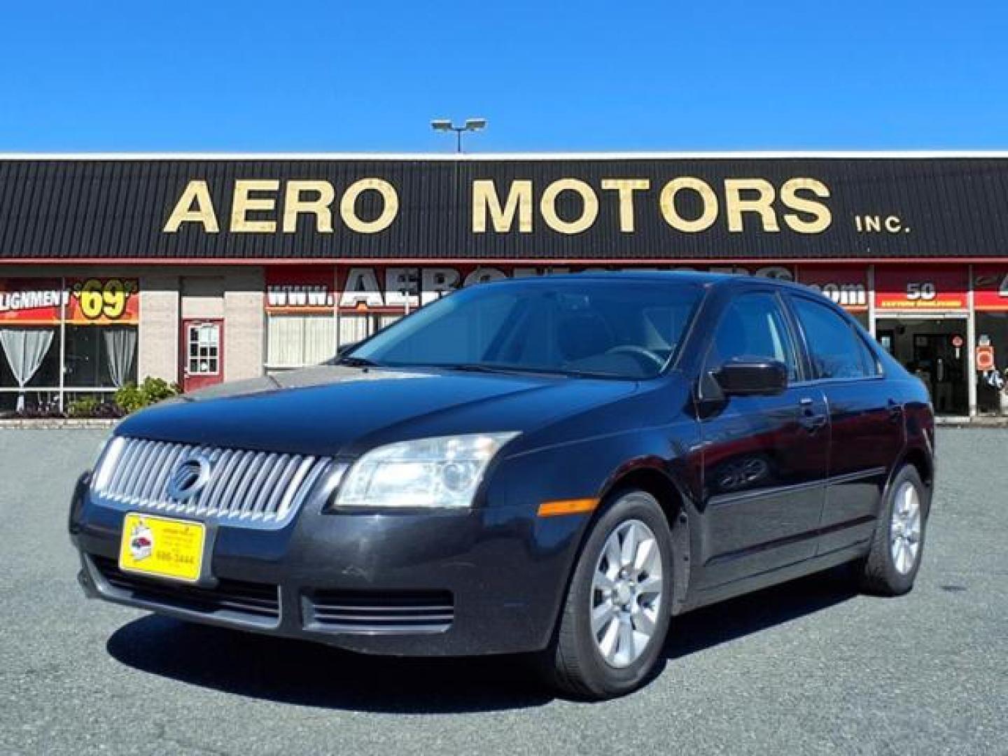 2009 Black Mercury Milan I-4 (3MEHM07Z39R) with an 2.3L 4 Cylinder Sequential-Port F.I. engine, Automatic transmission, located at 50 Eastern Blvd., Essex, MD, 21221, (410) 686-3444, 39.304367, -76.484947 - Photo#0