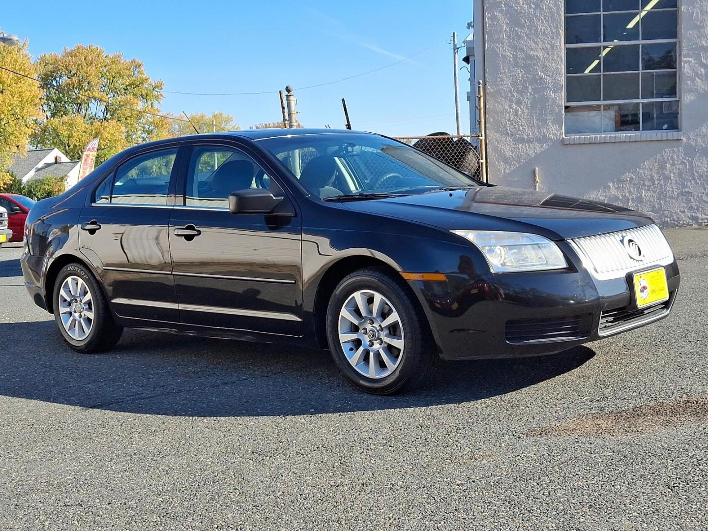2009 Black Mercury Milan I-4 (3MEHM07Z39R) with an 2.3L 4 Cylinder Sequential-Port F.I. engine, Automatic transmission, located at 50 Eastern Blvd., Essex, MD, 21221, (410) 686-3444, 39.304367, -76.484947 - Photo#22