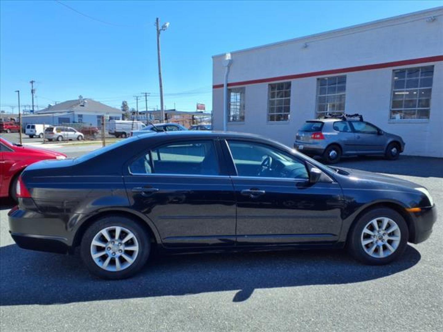 2009 Black Mercury Milan I-4 (3MEHM07Z39R) with an 2.3L 4 Cylinder Sequential-Port F.I. engine, Automatic transmission, located at 50 Eastern Blvd., Essex, MD, 21221, (410) 686-3444, 39.304367, -76.484947 - Photo#3
