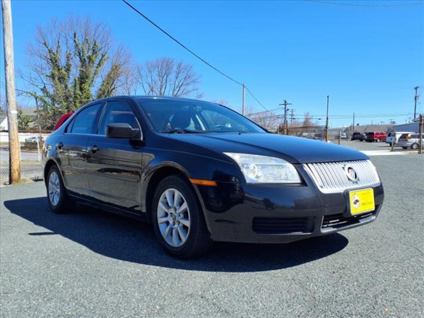 2009 Black Mercury Milan I-4 (3MEHM07Z39R) with an 2.3L 4 Cylinder Sequential-Port F.I. engine, Automatic transmission, located at 50 Eastern Blvd., Essex, MD, 21221, (410) 686-3444, 39.304367, -76.484947 - Photo#4