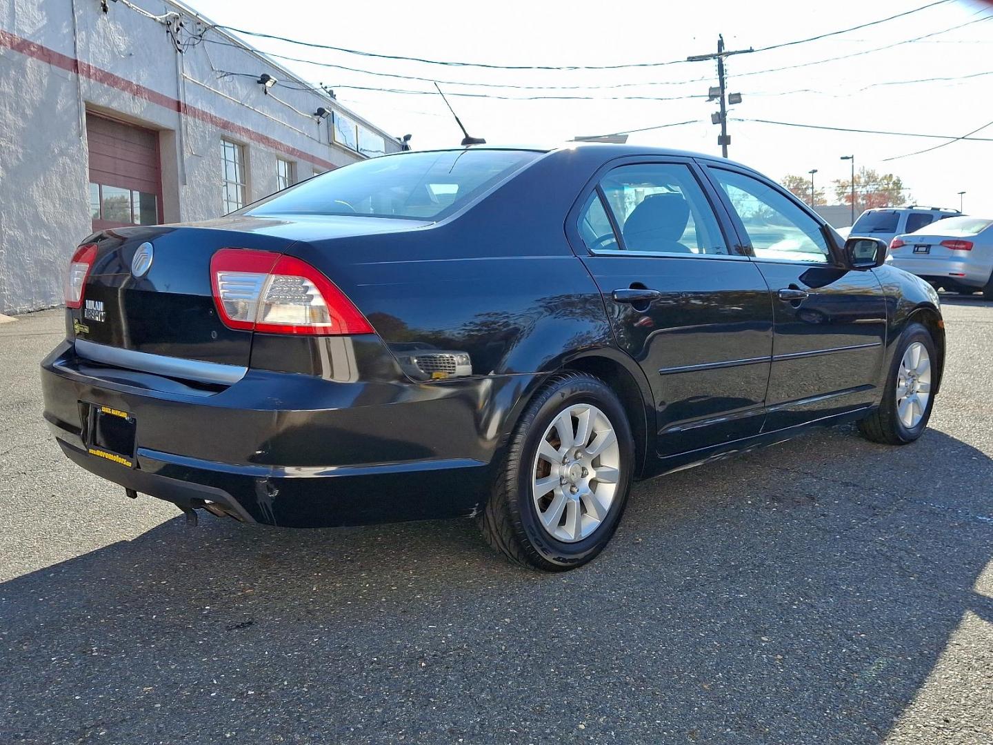 2009 Black Mercury Milan I-4 (3MEHM07Z39R) with an 2.3L 4 Cylinder Sequential-Port F.I. engine, Automatic transmission, located at 50 Eastern Blvd., Essex, MD, 21221, (410) 686-3444, 39.304367, -76.484947 - Photo#23