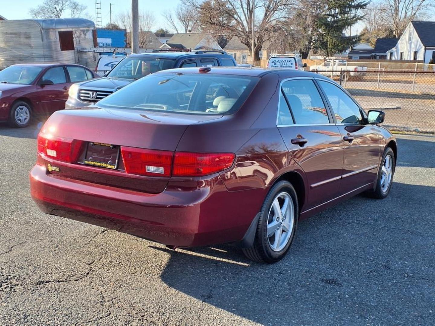 2005 Redondo Red Pearl Honda Accord EX w/Leather (1HGCM56865A) with an 2.4L 4 Cylinder Fuel Injected engine, Automatic transmission, located at 50 Eastern Blvd., Essex, MD, 21221, (410) 686-3444, 39.304367, -76.484947 - Photo#4