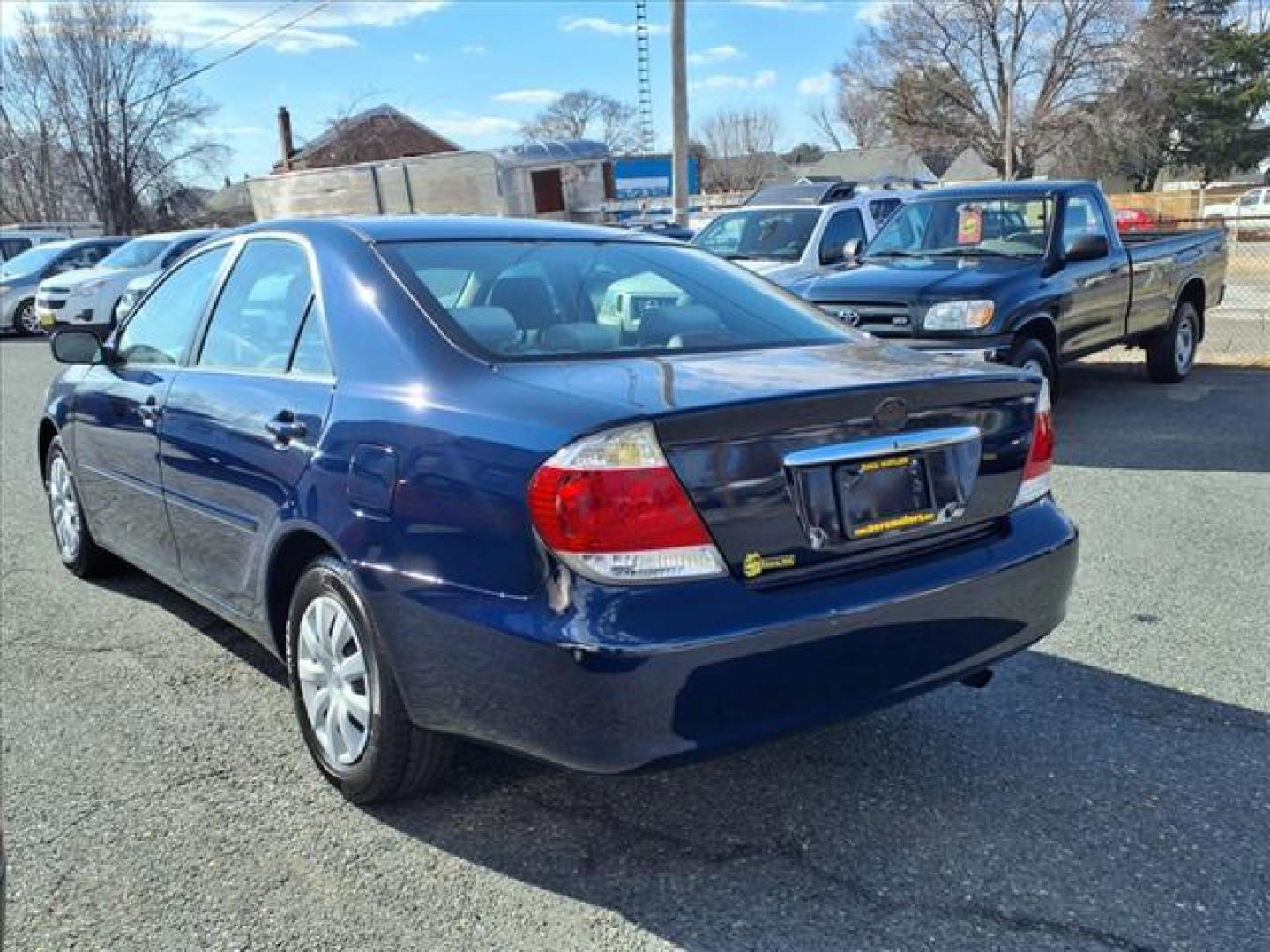 2005 Indigo Ink Pearl Toyota Camry LE (4T1BE30K15U) with an 2.4L 2.4L I4 160hp 163ft. lbs. Fuel Injected engine, Automatic transmission, located at 50 Eastern Blvd., Essex, MD, 21221, (410) 686-3444, 39.304367, -76.484947 - Photo#2