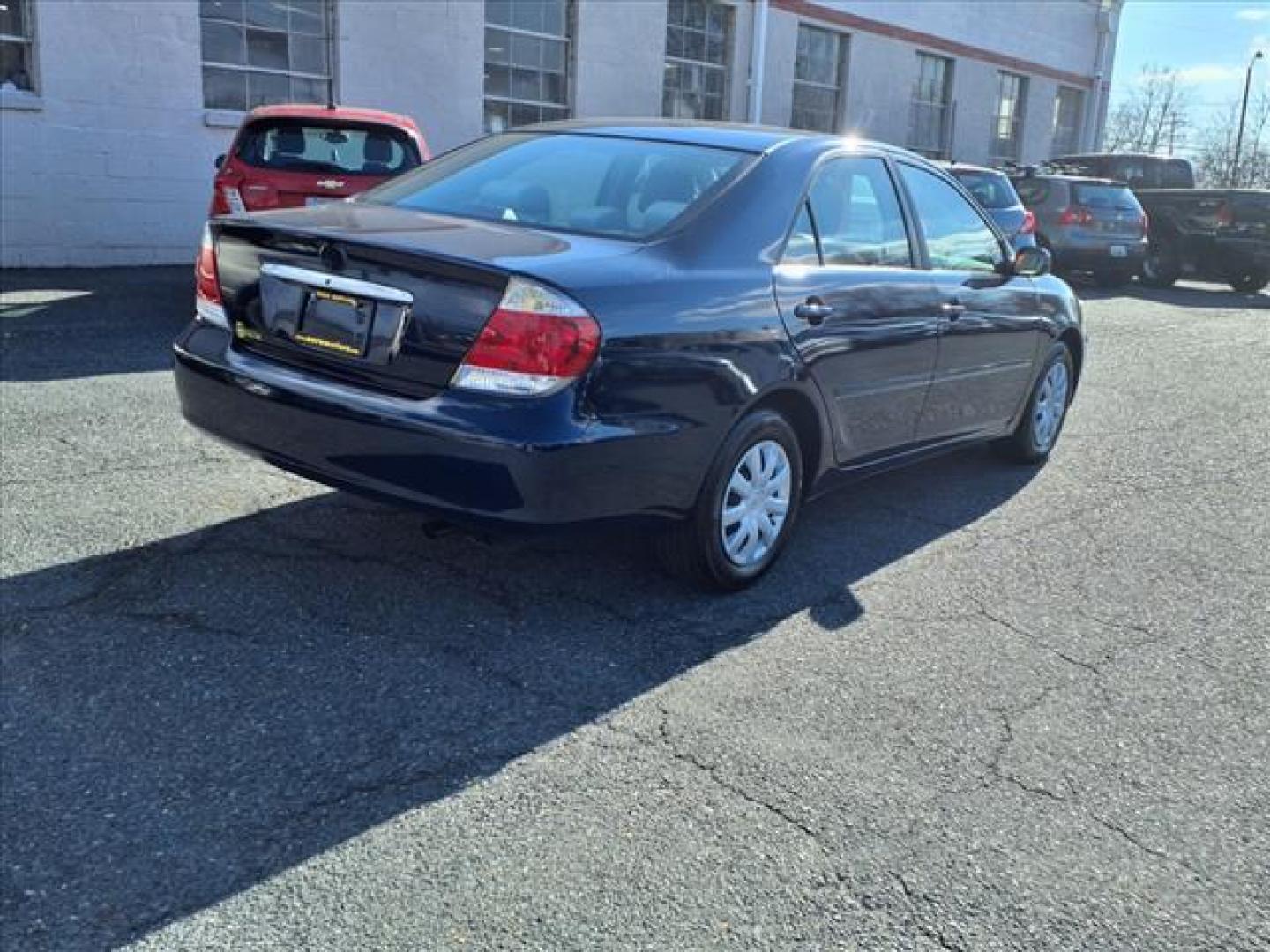 2005 Indigo Ink Pearl Toyota Camry LE (4T1BE30K15U) with an 2.4L 2.4L I4 160hp 163ft. lbs. Fuel Injected engine, Automatic transmission, located at 50 Eastern Blvd., Essex, MD, 21221, (410) 686-3444, 39.304367, -76.484947 - Photo#4