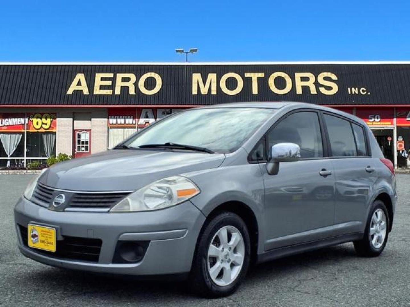 2007 Silver Nissan Versa 1.8 SL (3N1BC13E27L) with an 1.8L 1.8L I4 122hp 127ft. lbs. Sequential-Port F.I. engine, CVT transmission, located at 50 Eastern Blvd., Essex, MD, 21221, (410) 686-3444, 39.304367, -76.484947 - Photo#0