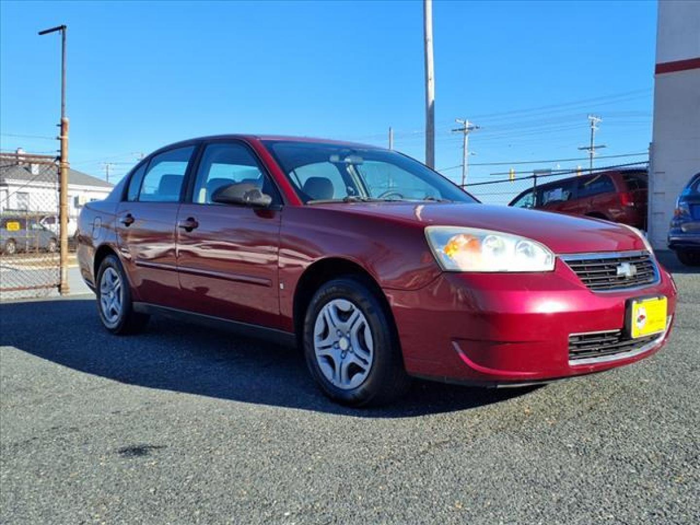 2006 Sport Red Metallic Chevrolet Malibu LS (1G1ZS51F36F) with an 2.2L 4 Cylinder Fuel Injected engine, Automatic transmission, located at 50 Eastern Blvd., Essex, MD, 21221, (410) 686-3444, 39.304367, -76.484947 - Photo#5