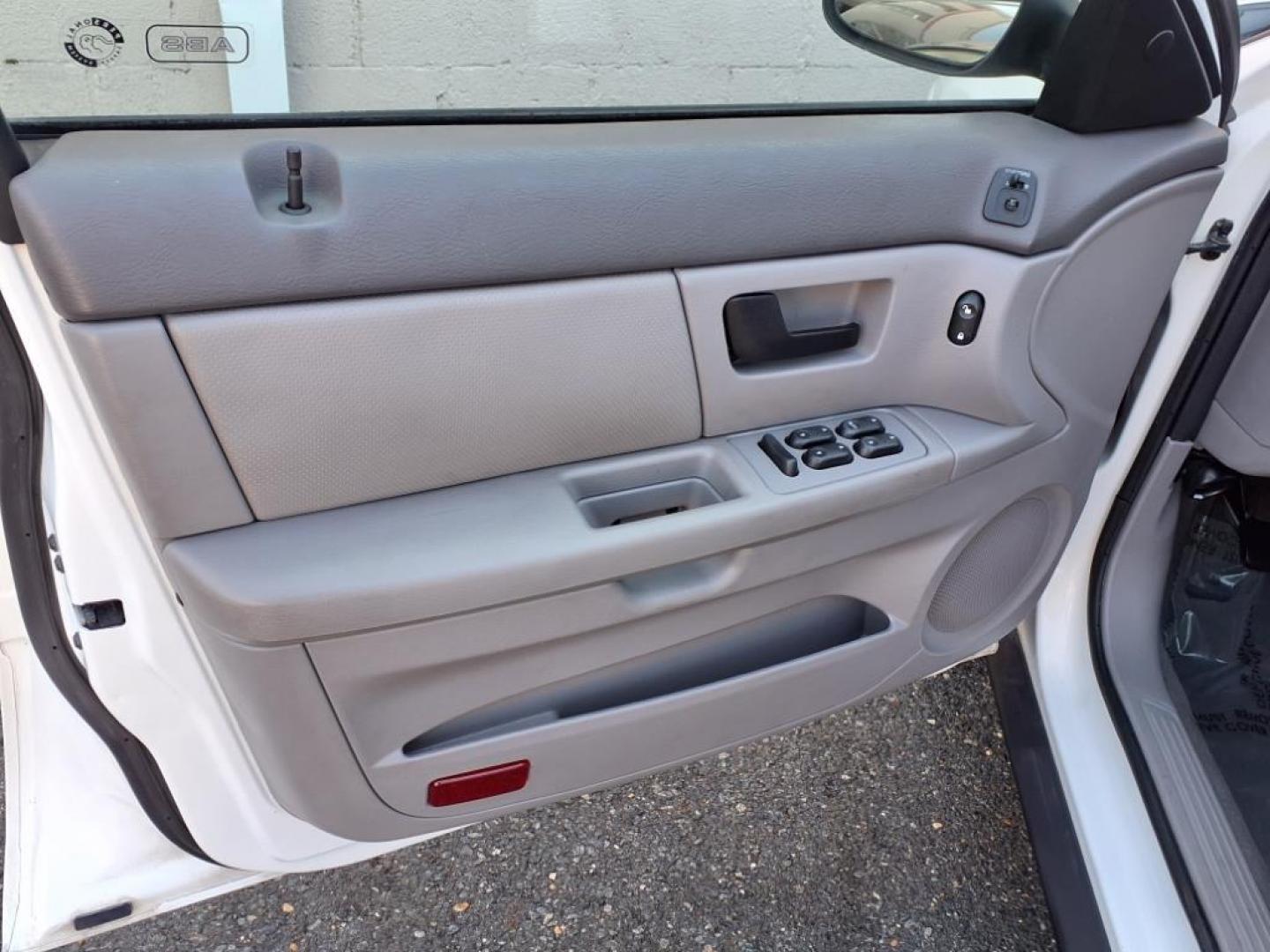 2004 White Ford Taurus SE (1FAFP53234G) with an 3.0L 6 Cylinder Fuel Injected engine, Automatic transmission, located at 50 Eastern Blvd., Essex, MD, 21221, (410) 686-3444, 39.304367, -76.484947 - Photo#8