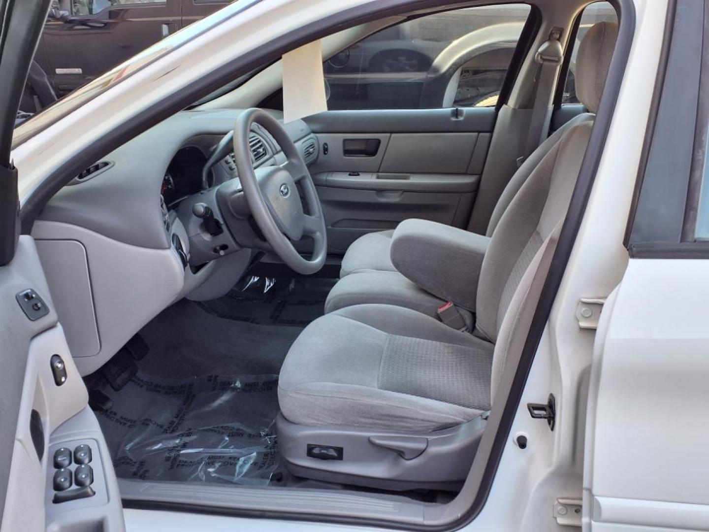 2004 White Ford Taurus SE (1FAFP53234G) with an 3.0L 6 Cylinder Fuel Injected engine, Automatic transmission, located at 50 Eastern Blvd., Essex, MD, 21221, (410) 686-3444, 39.304367, -76.484947 - Photo#10