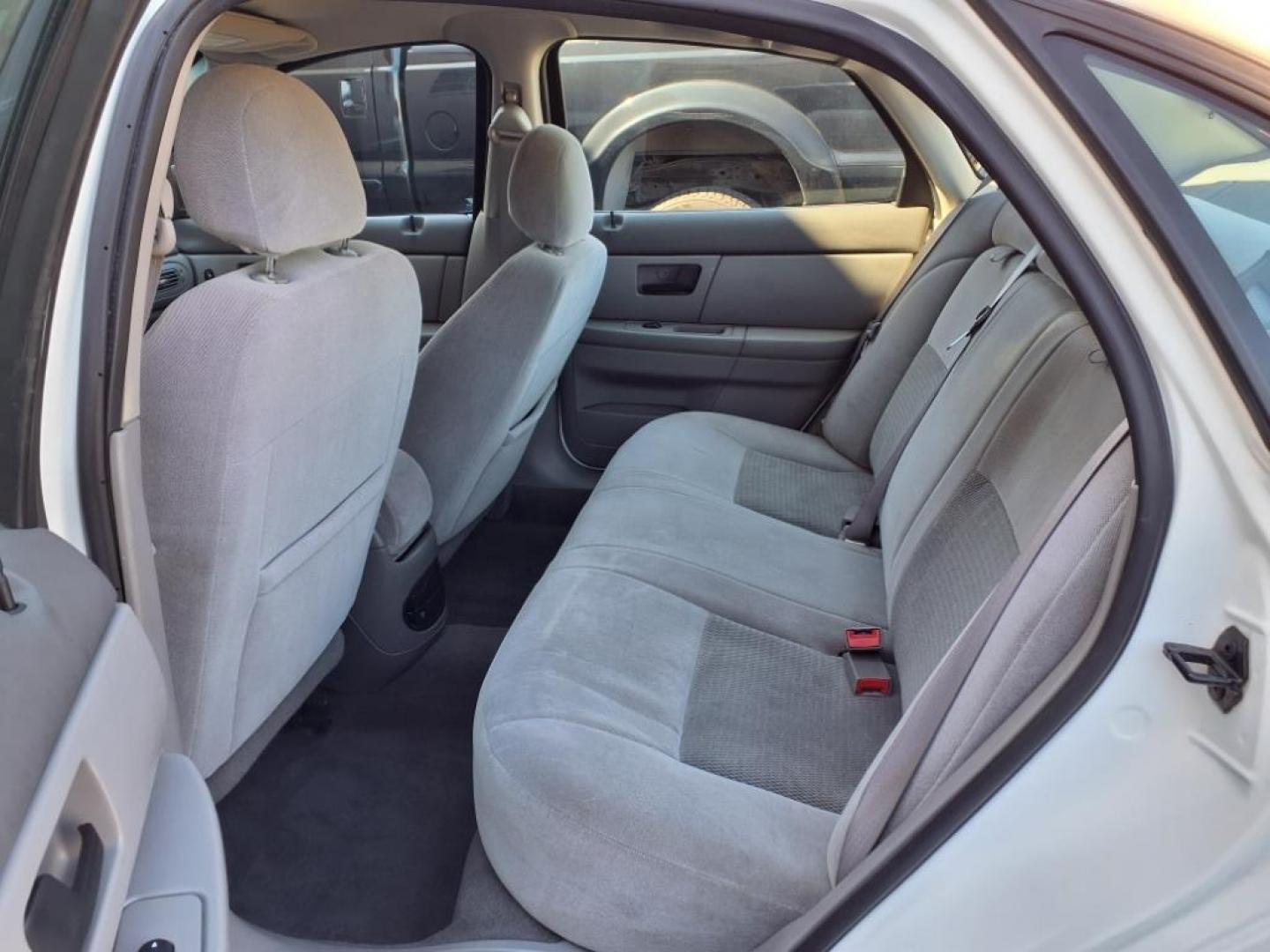 2004 White Ford Taurus SE (1FAFP53234G) with an 3.0L 6 Cylinder Fuel Injected engine, Automatic transmission, located at 50 Eastern Blvd., Essex, MD, 21221, (410) 686-3444, 39.304367, -76.484947 - Photo#11