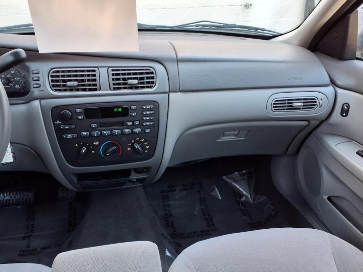 2004 White Ford Taurus SE (1FAFP53234G) with an 3.0L 6 Cylinder Fuel Injected engine, Automatic transmission, located at 50 Eastern Blvd., Essex, MD, 21221, (410) 686-3444, 39.304367, -76.484947 - Photo#14