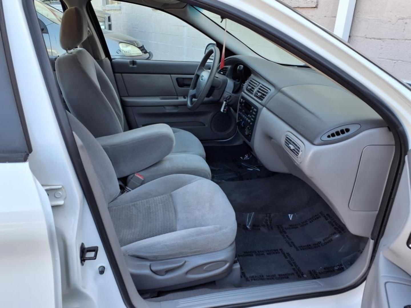 2004 White Ford Taurus SE (1FAFP53234G) with an 3.0L 6 Cylinder Fuel Injected engine, Automatic transmission, located at 50 Eastern Blvd., Essex, MD, 21221, (410) 686-3444, 39.304367, -76.484947 - Photo#15
