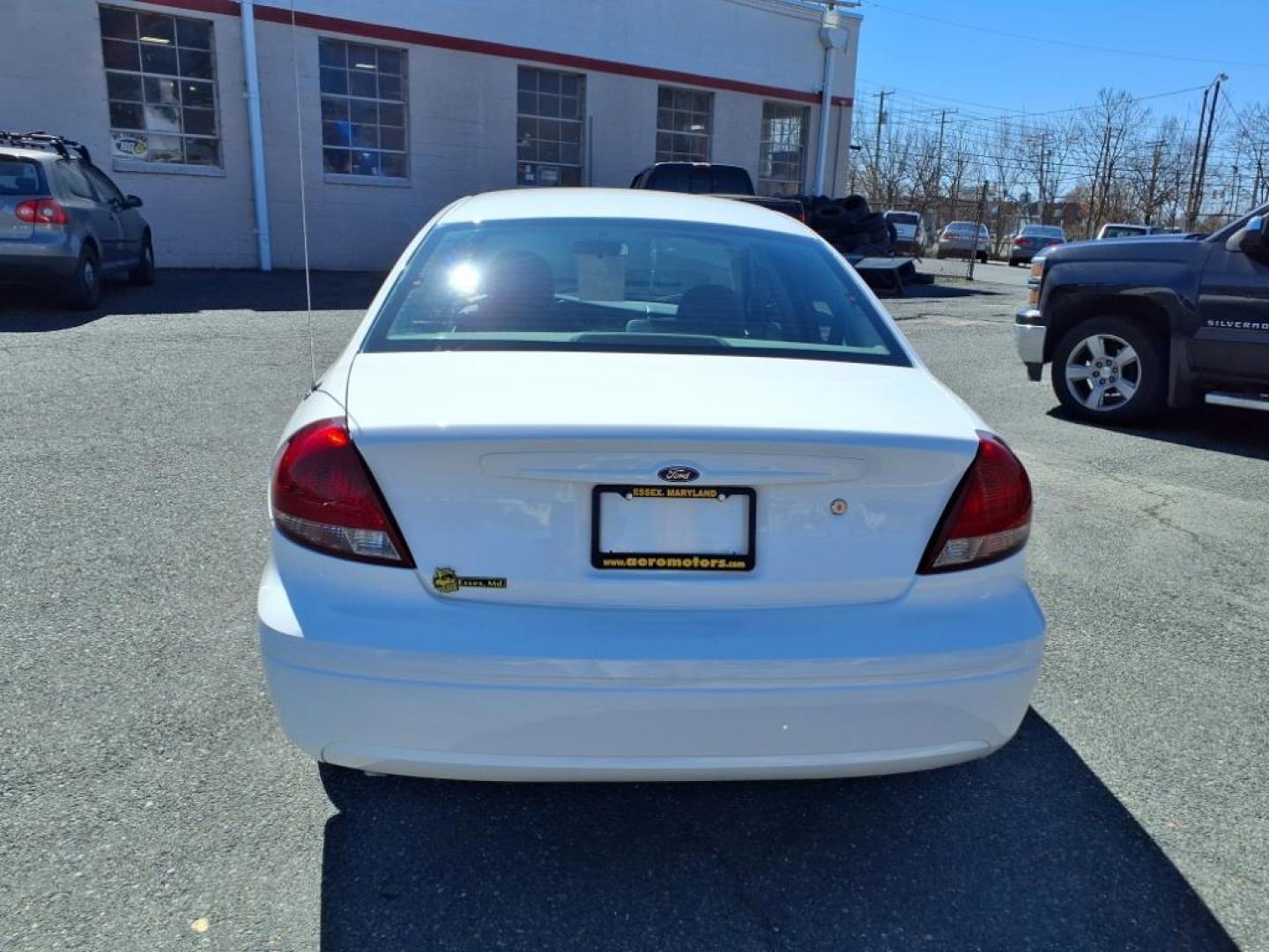 2004 White Ford Taurus SE (1FAFP53234G) with an 3.0L 6 Cylinder Fuel Injected engine, Automatic transmission, located at 50 Eastern Blvd., Essex, MD, 21221, (410) 686-3444, 39.304367, -76.484947 - Photo#3