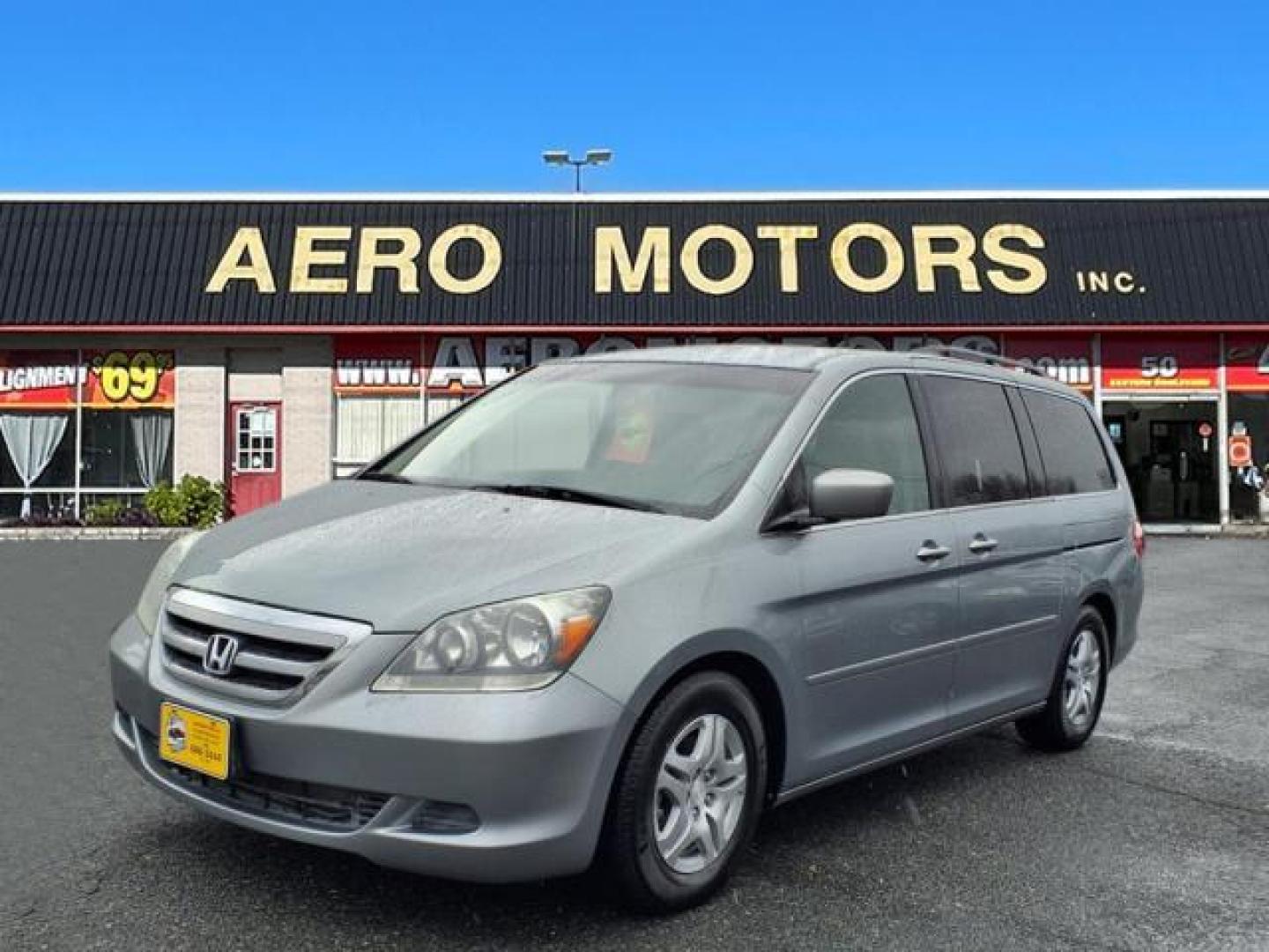 2007 Ocean Mist Metallic Honda Odyssey EX (5FNRL38477B) with an 3.5L 6 Cylinder Sequential-Port F.I. engine, Automatic transmission, located at 50 Eastern Blvd., Essex, MD, 21221, (410) 686-3444, 39.304367, -76.484947 - Photo#0