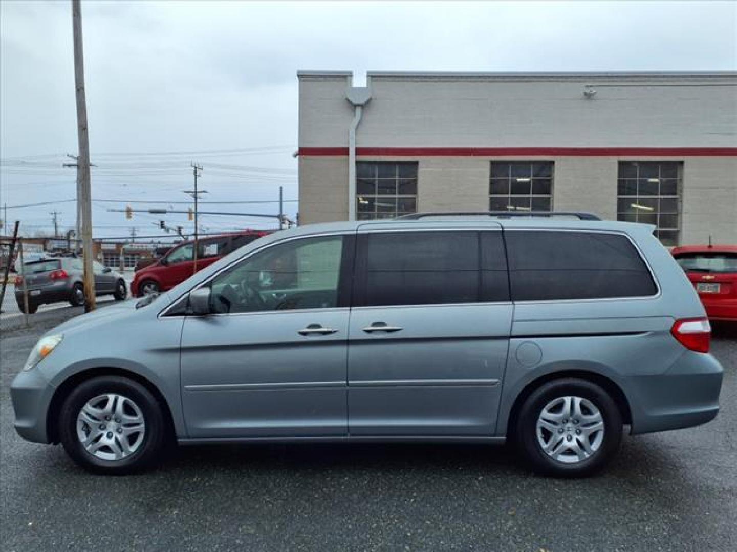 2007 Ocean Mist Metallic Honda Odyssey EX (5FNRL38477B) with an 3.5L 6 Cylinder Sequential-Port F.I. engine, Automatic transmission, located at 50 Eastern Blvd., Essex, MD, 21221, (410) 686-3444, 39.304367, -76.484947 - Photo#1