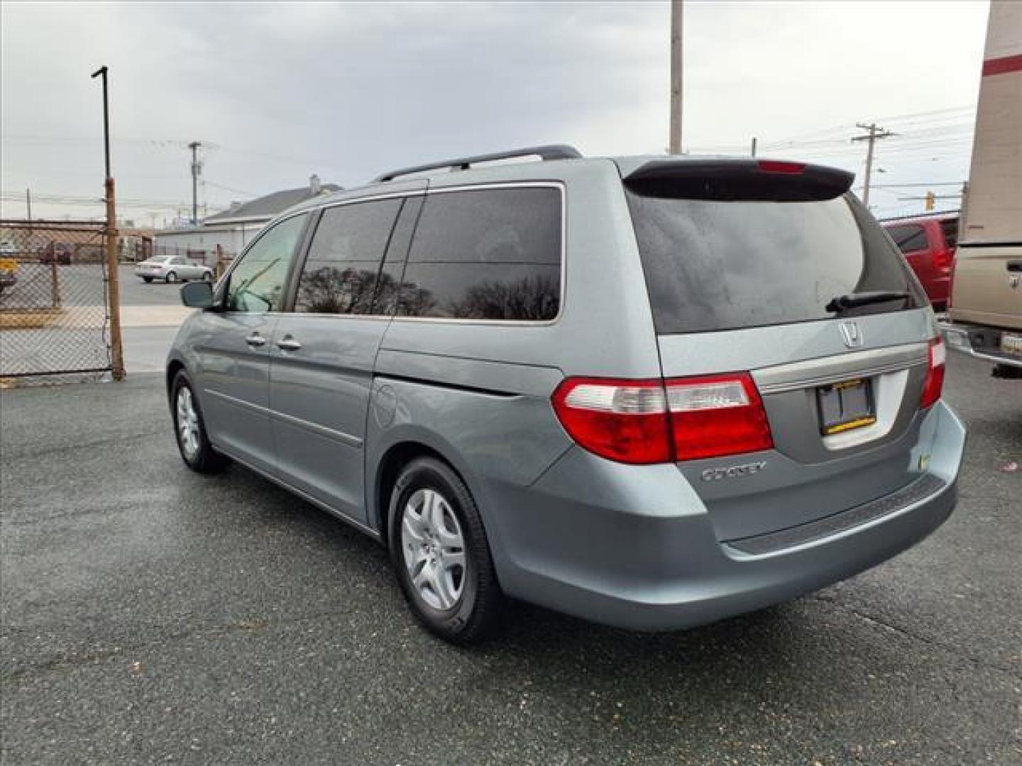 2007 Ocean Mist Metallic Honda Odyssey EX (5FNRL38477B) with an 3.5L 6 Cylinder Sequential-Port F.I. engine, Automatic transmission, located at 50 Eastern Blvd., Essex, MD, 21221, (410) 686-3444, 39.304367, -76.484947 - Photo#2