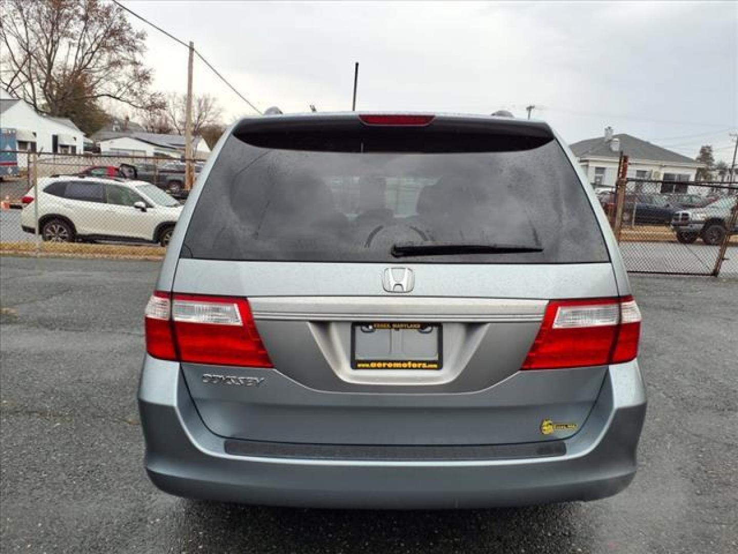 2007 Ocean Mist Metallic Honda Odyssey EX (5FNRL38477B) with an 3.5L 6 Cylinder Sequential-Port F.I. engine, Automatic transmission, located at 50 Eastern Blvd., Essex, MD, 21221, (410) 686-3444, 39.304367, -76.484947 - Photo#3