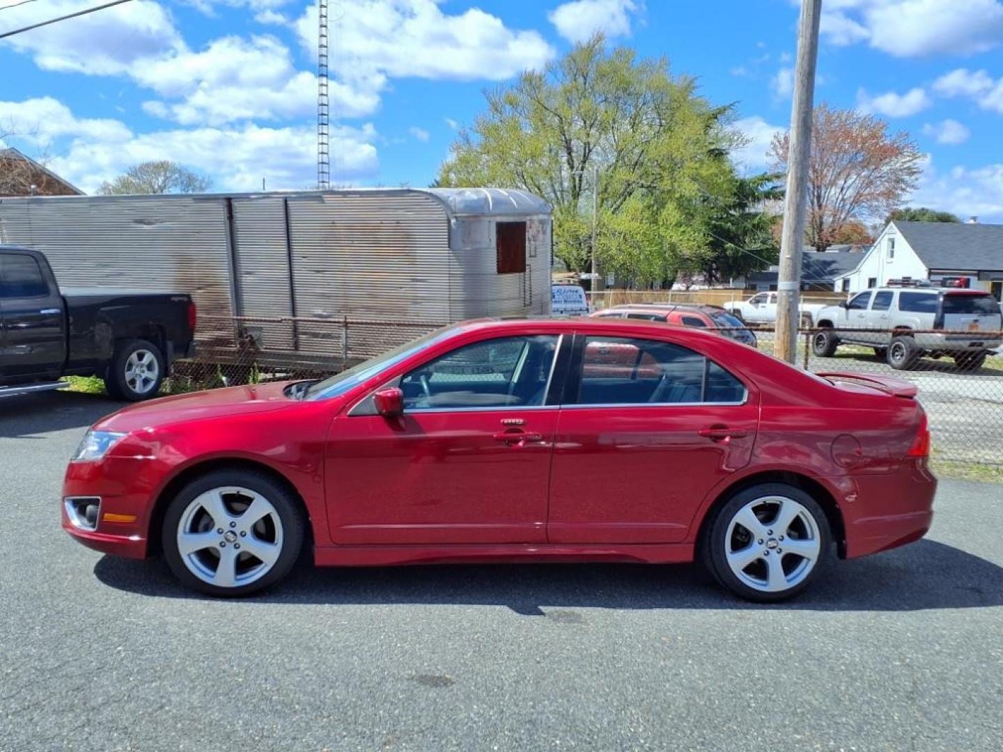 2010 Sangria Red Clearcoat Metallic Ford Fusion Sport (3FAHP0KC1AR) with an 3.5L 6 Cylinder Sequential-Port F.I. engine, Automatic transmission, located at 50 Eastern Blvd., Essex, MD, 21221, (410) 686-3444, 39.304367, -76.484947 - Photo#1