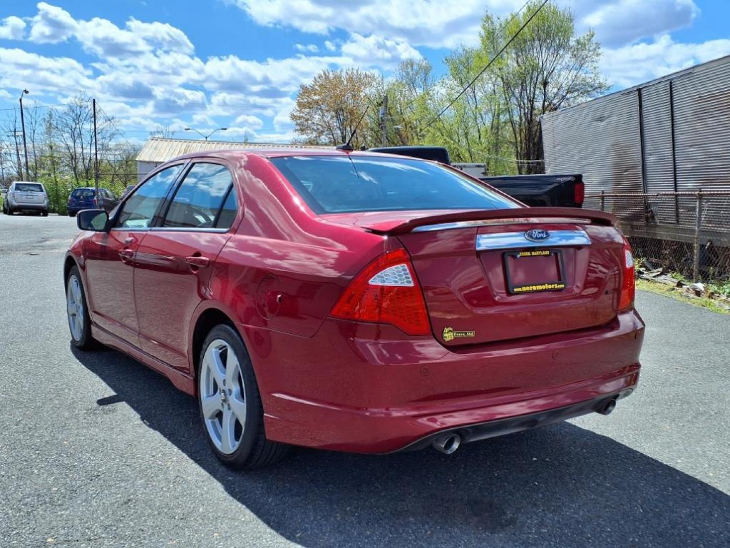 2010 Sangria Red Clearcoat Metallic Ford Fusion Sport (3FAHP0KC1AR) with an 3.5L 6 Cylinder Sequential-Port F.I. engine, Automatic transmission, located at 50 Eastern Blvd., Essex, MD, 21221, (410) 686-3444, 39.304367, -76.484947 - Photo#2
