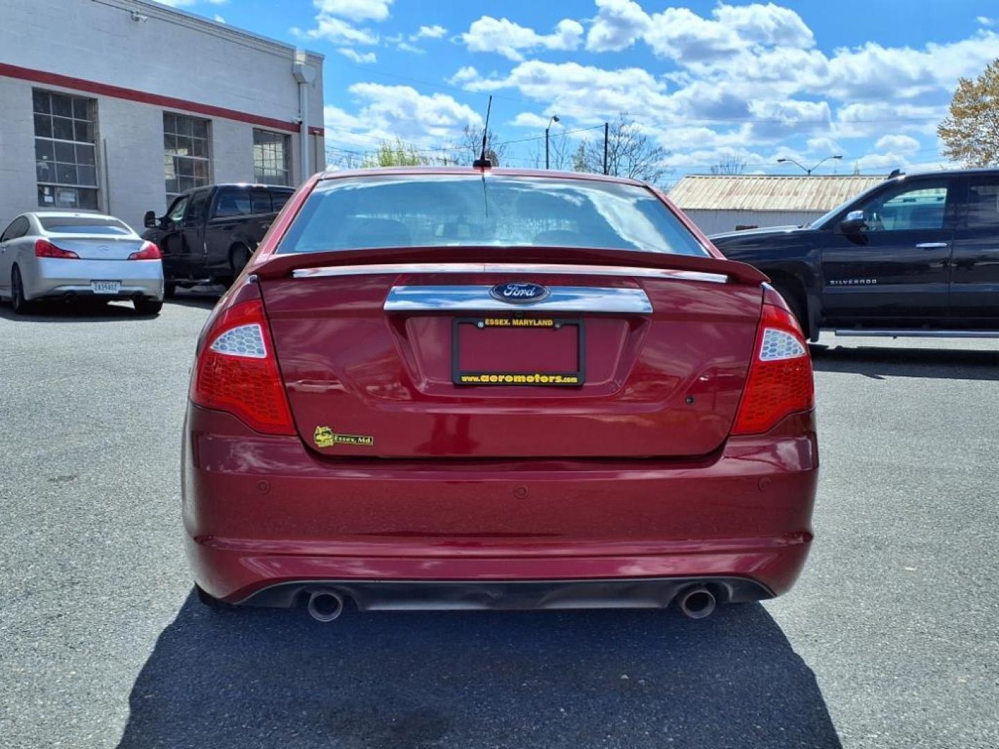 2010 Sangria Red Clearcoat Metallic Ford Fusion Sport (3FAHP0KC1AR) with an 3.5L 6 Cylinder Sequential-Port F.I. engine, Automatic transmission, located at 50 Eastern Blvd., Essex, MD, 21221, (410) 686-3444, 39.304367, -76.484947 - Photo#3