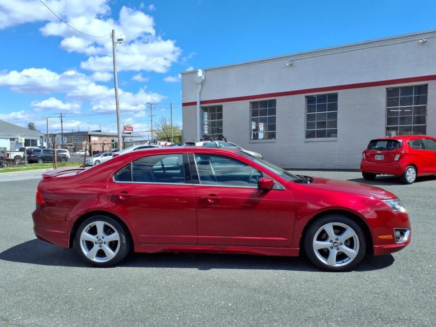 2010 Sangria Red Clearcoat Metallic Ford Fusion Sport (3FAHP0KC1AR) with an 3.5L 6 Cylinder Sequential-Port F.I. engine, Automatic transmission, located at 50 Eastern Blvd., Essex, MD, 21221, (410) 686-3444, 39.304367, -76.484947 - Photo#5