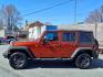 2014 Copperhead Pearl Coat Jeep Wrangler Unlimited Sport (1C4BJWDG4EL) with an 3.6L 6 Cylinder Sequential-Port F.I. engine, 5-Speed Automatic transmission, located at 50 Eastern Blvd., Essex, MD, 21221, (410) 686-3444, 39.304367, -76.484947 - Photo#1
