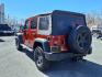 2014 Copperhead Pearl Coat Jeep Wrangler Unlimited Sport (1C4BJWDG4EL) with an 3.6L 6 Cylinder Sequential-Port F.I. engine, 5-Speed Automatic transmission, located at 50 Eastern Blvd., Essex, MD, 21221, (410) 686-3444, 39.304367, -76.484947 - Photo#2