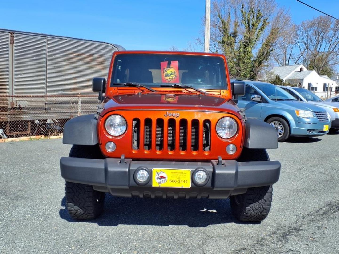 2014 Copperhead Pearl Coat Jeep Wrangler Unlimited Sport (1C4BJWDG4EL) with an 3.6L 6 Cylinder Sequential-Port F.I. engine, 5-Speed Automatic transmission, located at 50 Eastern Blvd., Essex, MD, 21221, (410) 686-3444, 39.304367, -76.484947 - Photo#7
