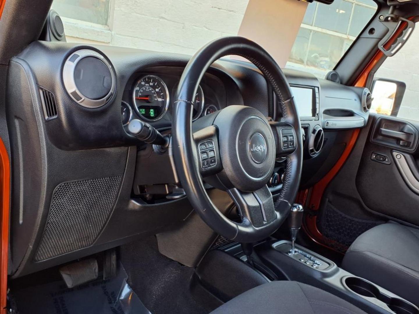 2014 Copperhead Pearl Coat Jeep Wrangler Unlimited Sport (1C4BJWDG4EL) with an 3.6L 6 Cylinder Sequential-Port F.I. engine, 5-Speed Automatic transmission, located at 50 Eastern Blvd., Essex, MD, 21221, (410) 686-3444, 39.304367, -76.484947 - Photo#10