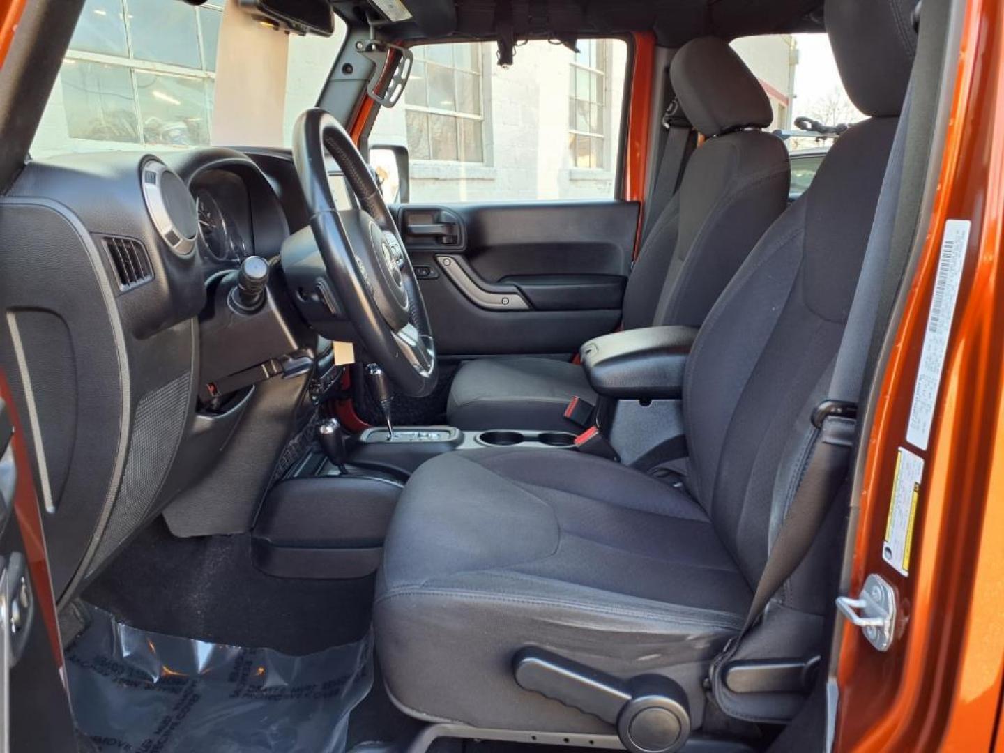 2014 Copperhead Pearl Coat Jeep Wrangler Unlimited Sport (1C4BJWDG4EL) with an 3.6L 6 Cylinder Sequential-Port F.I. engine, 5-Speed Automatic transmission, located at 50 Eastern Blvd., Essex, MD, 21221, (410) 686-3444, 39.304367, -76.484947 - Photo#11