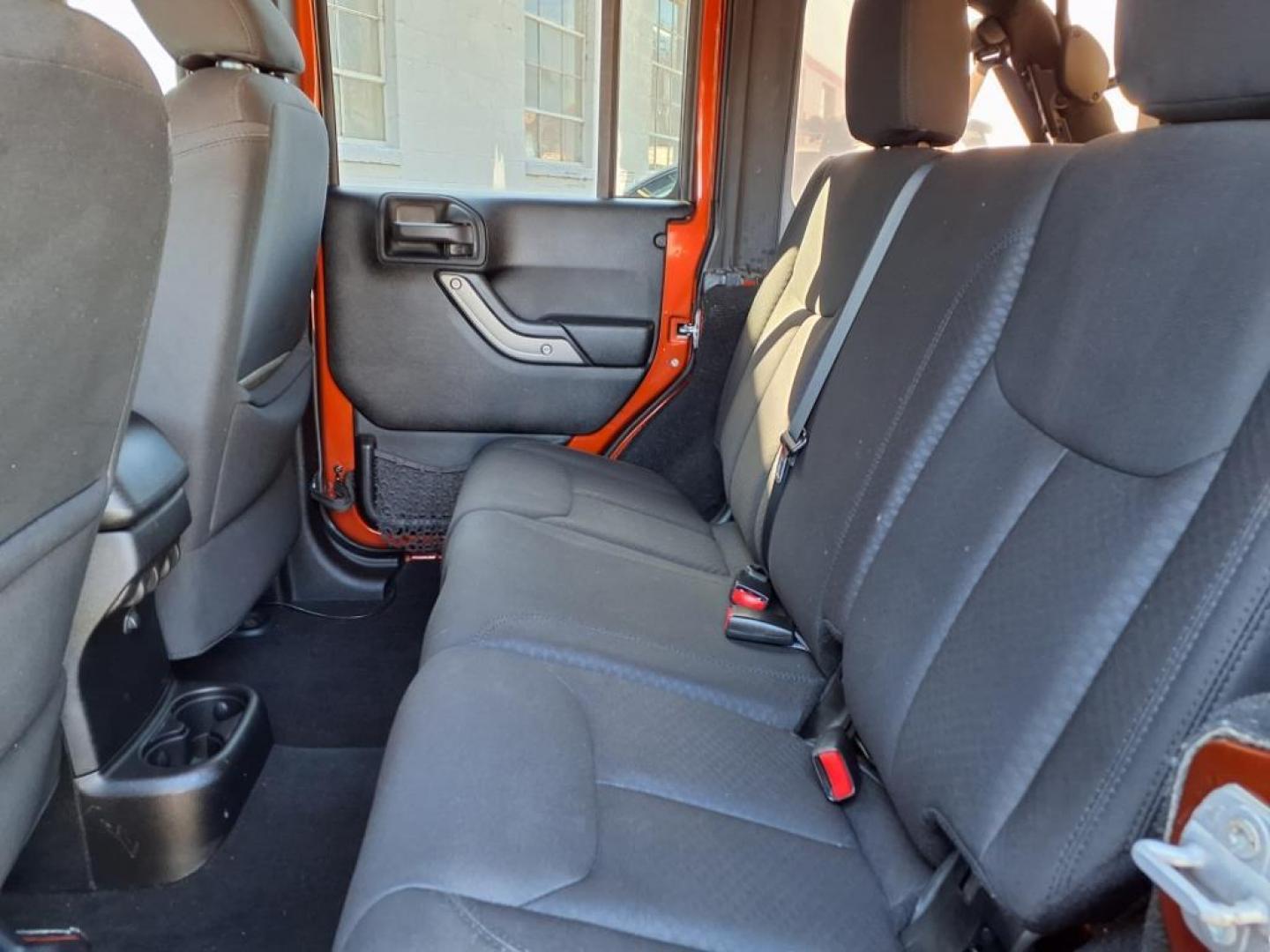 2014 Copperhead Pearl Coat Jeep Wrangler Unlimited Sport (1C4BJWDG4EL) with an 3.6L 6 Cylinder Sequential-Port F.I. engine, 5-Speed Automatic transmission, located at 50 Eastern Blvd., Essex, MD, 21221, (410) 686-3444, 39.304367, -76.484947 - Photo#12
