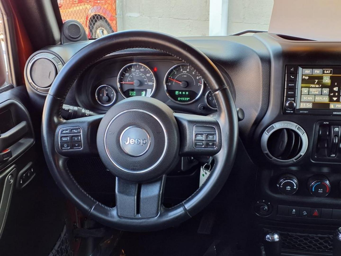 2014 Copperhead Pearl Coat Jeep Wrangler Unlimited Sport (1C4BJWDG4EL) with an 3.6L 6 Cylinder Sequential-Port F.I. engine, 5-Speed Automatic transmission, located at 50 Eastern Blvd., Essex, MD, 21221, (410) 686-3444, 39.304367, -76.484947 - Photo#13
