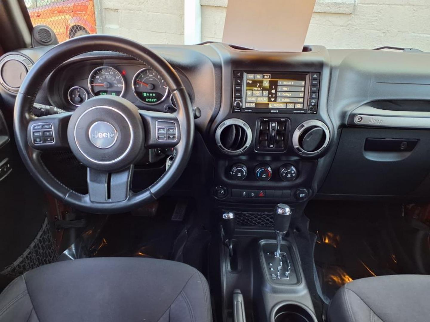 2014 Copperhead Pearl Coat Jeep Wrangler Unlimited Sport (1C4BJWDG4EL) with an 3.6L 6 Cylinder Sequential-Port F.I. engine, 5-Speed Automatic transmission, located at 50 Eastern Blvd., Essex, MD, 21221, (410) 686-3444, 39.304367, -76.484947 - Photo#14
