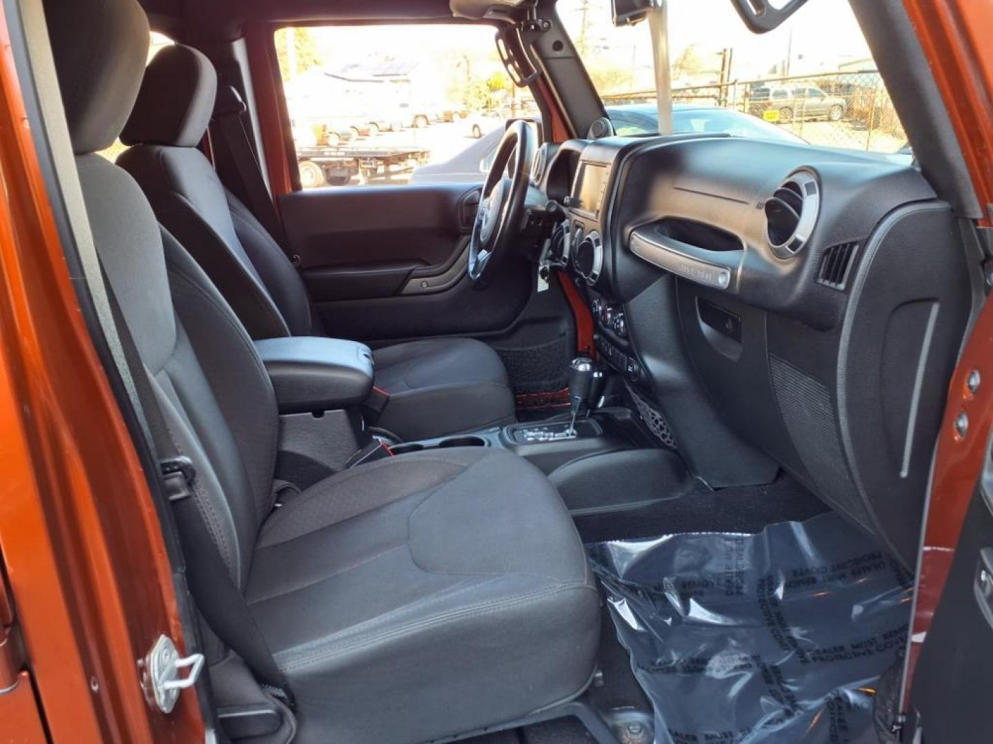 2014 Copperhead Pearl Coat Jeep Wrangler Unlimited Sport (1C4BJWDG4EL) with an 3.6L 6 Cylinder Sequential-Port F.I. engine, 5-Speed Automatic transmission, located at 50 Eastern Blvd., Essex, MD, 21221, (410) 686-3444, 39.304367, -76.484947 - Photo#16