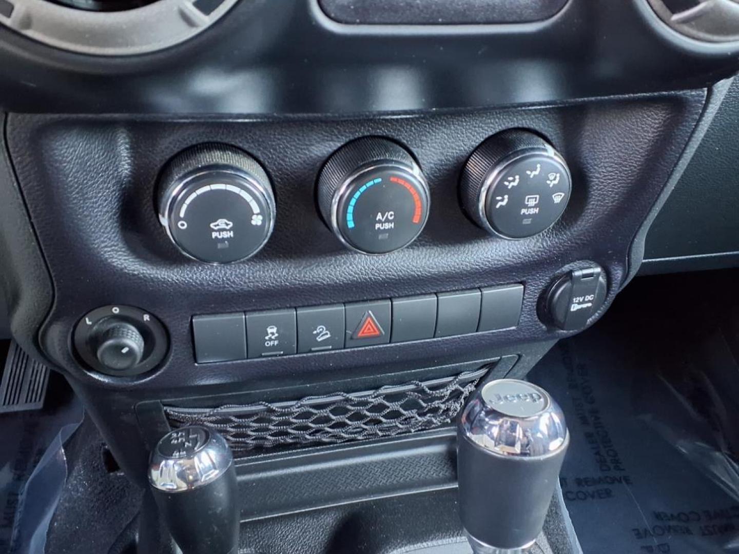 2014 Copperhead Pearl Coat Jeep Wrangler Unlimited Sport (1C4BJWDG4EL) with an 3.6L 6 Cylinder Sequential-Port F.I. engine, 5-Speed Automatic transmission, located at 50 Eastern Blvd., Essex, MD, 21221, (410) 686-3444, 39.304367, -76.484947 - Photo#18