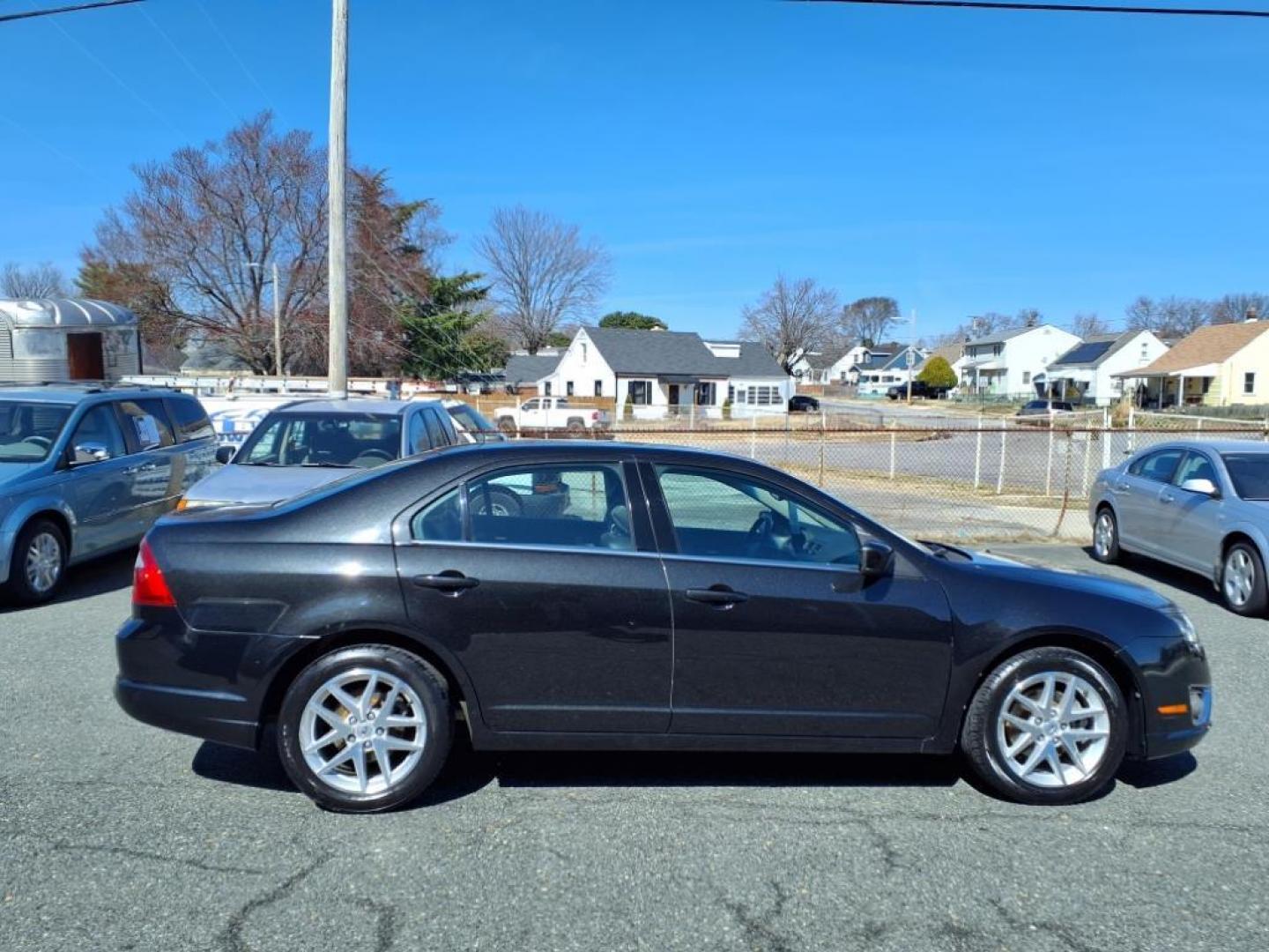 2012 Black Ua Ford Fusion SEL (3FAHP0JG3CR) with an 3.0L 6 Cylinder Sequential-Port F.I. engine, Automatic transmission, located at 50 Eastern Blvd., Essex, MD, 21221, (410) 686-3444, 39.304367, -76.484947 - Photo#5